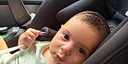 Dahlia Mila joined the competition — help win amazing prizes! baby, car_seat, maxi_cosi, infant, child, seatbelt, safety, car_interior, window, straps, cute, portrait, young_child, holding, person, face, looking, indoors, clothing, seat