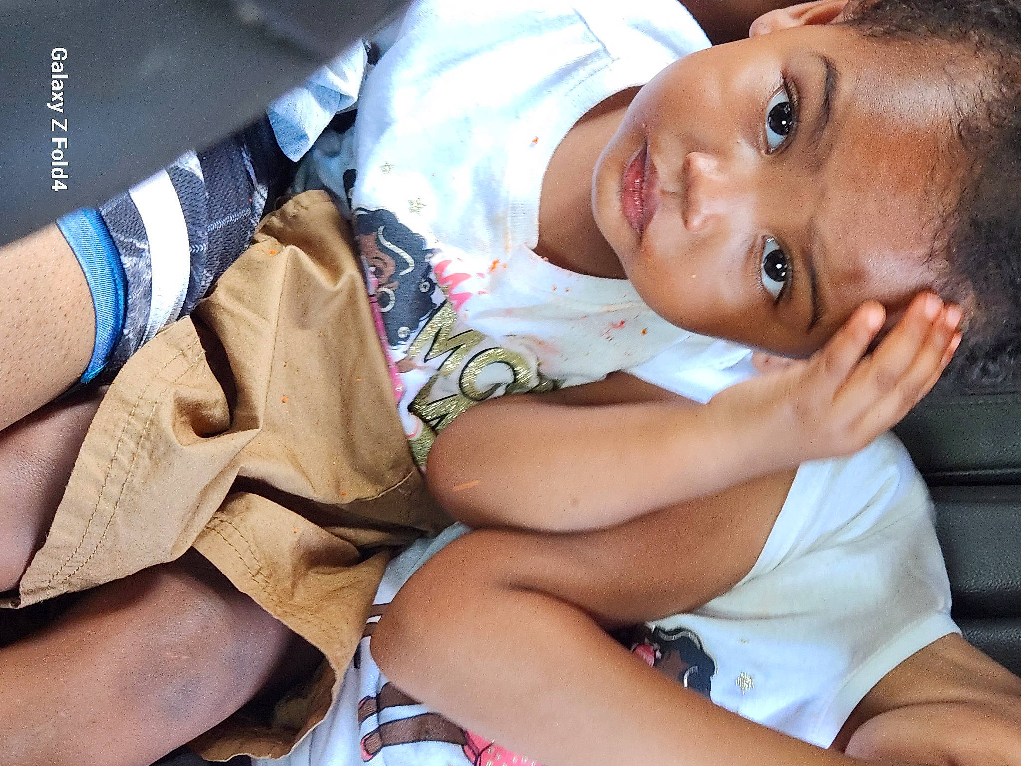 Makahyia is registered to the contest to win money with this photo: abdomen, baby, baby_products, baby_toddler_clothing, child, comfort, elbow, flash_photography, happy, human_leg, knee, pattern, person, portrait_photography, sitting, skin, thigh, tie, toddler, uniform