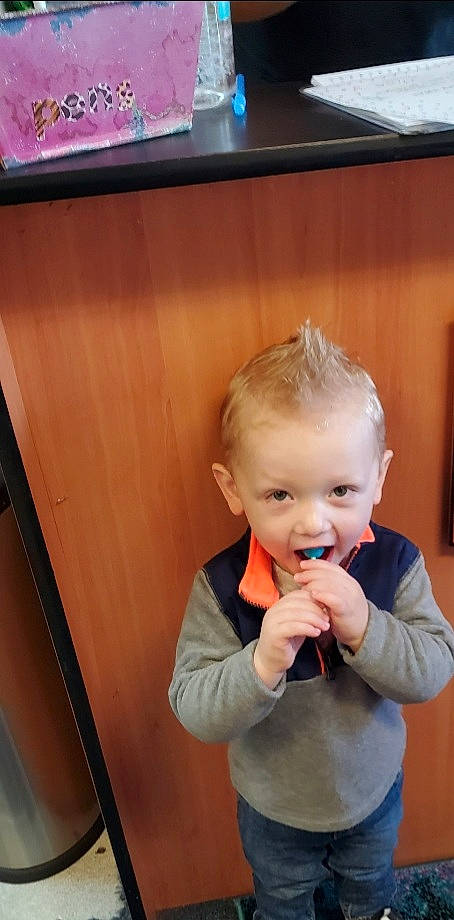 Jayden is registered to the contest to win money with this photo: baby, baby_grabbing_for_something, baby_toddler_clothing, blond, child, eating, finger, hand, kitchen_utensil, person, taste, thumb, toddler, varnish, wood_stain