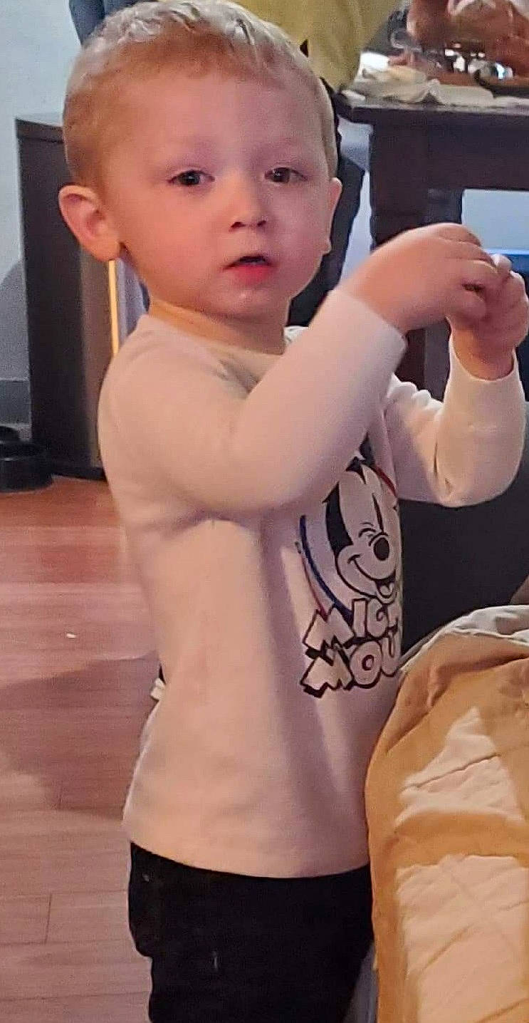 Jayden is registered to the contest to win money with this photo: baby, baby_toddler_clothing, cheek, child, cool, elbow, finger, gesture, hand, joint, khaki, muscle, nail, person, shoulder, skin, sleeve, standing, thumb, toddler