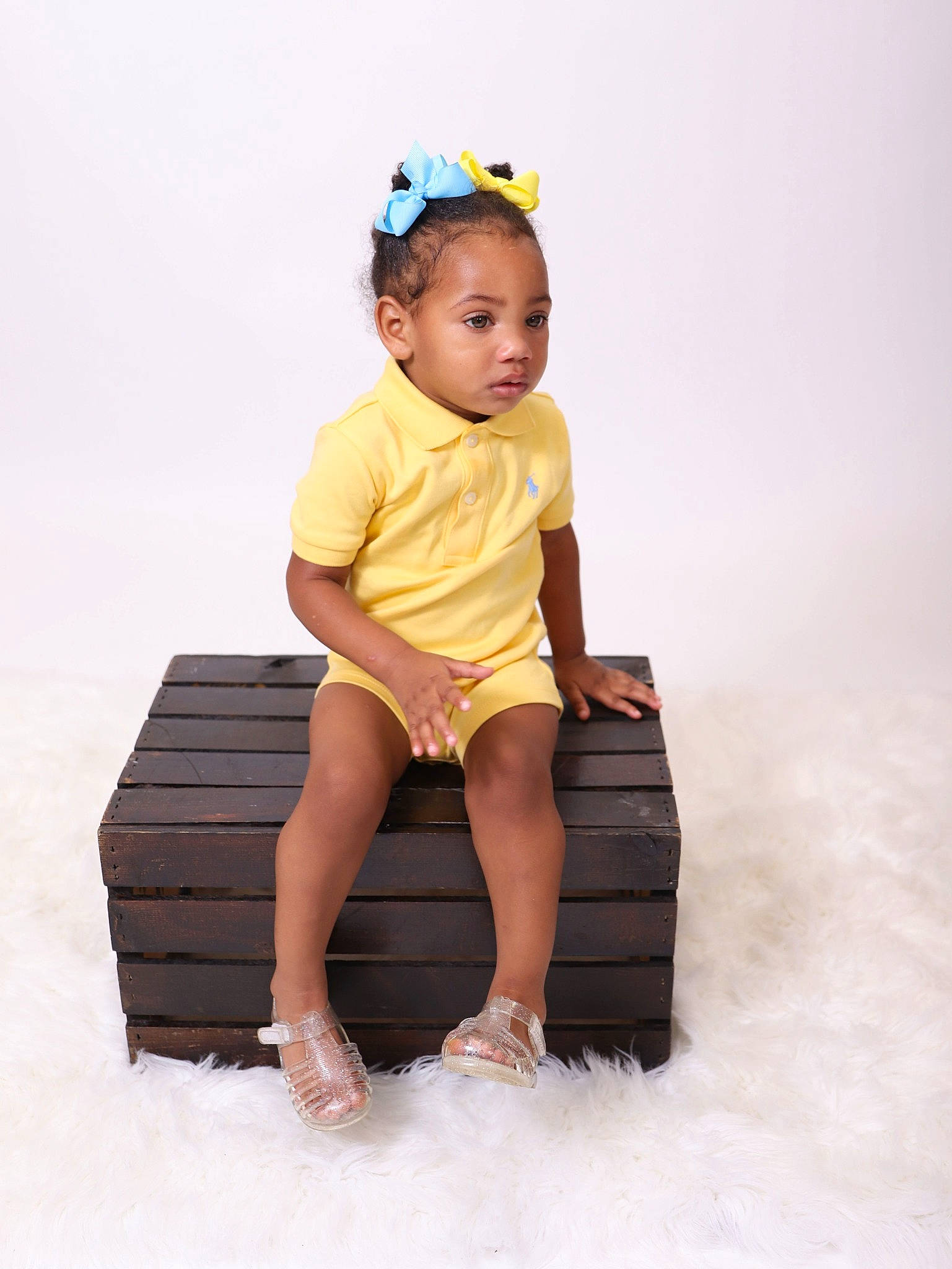 Jai'Lah joined the competition — help win amazing prizes! baby, baby_toddler_clothing, child, child_model, furniture, hair_accessory, headband, person, photography, sitting, sleeve, standing, toddler, white, yellow