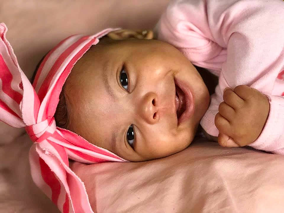 Aribella joined the competition — help win amazing prizes! baby, cheek, child, close_up, ear, eye, face, hand, head, headwear, lip, mouth, nose, person, photography, pink, portrait_photography, skin, toddler