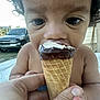 Jayton is registered to the contest to win money with this photo: background, child, chocolate, closeup, cone, curly_hair, cute, dessert, eating, face, food, hand, ice_cream, outdoor, person, skin, summer, sweet, toddler, vehicle