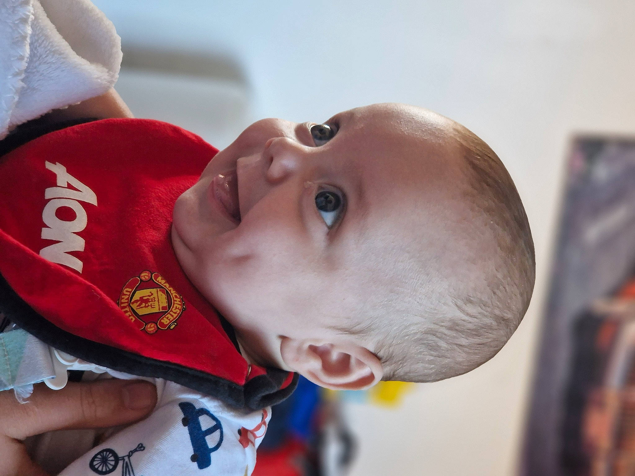 Harry is registered to the contest to win money with this photo: baby, cheek, child, close_up, ear, eye, eyebrow, forehead, hair, happy, head, headgear, lip, mouth, neck, nose, person, skin, sleeve, smile