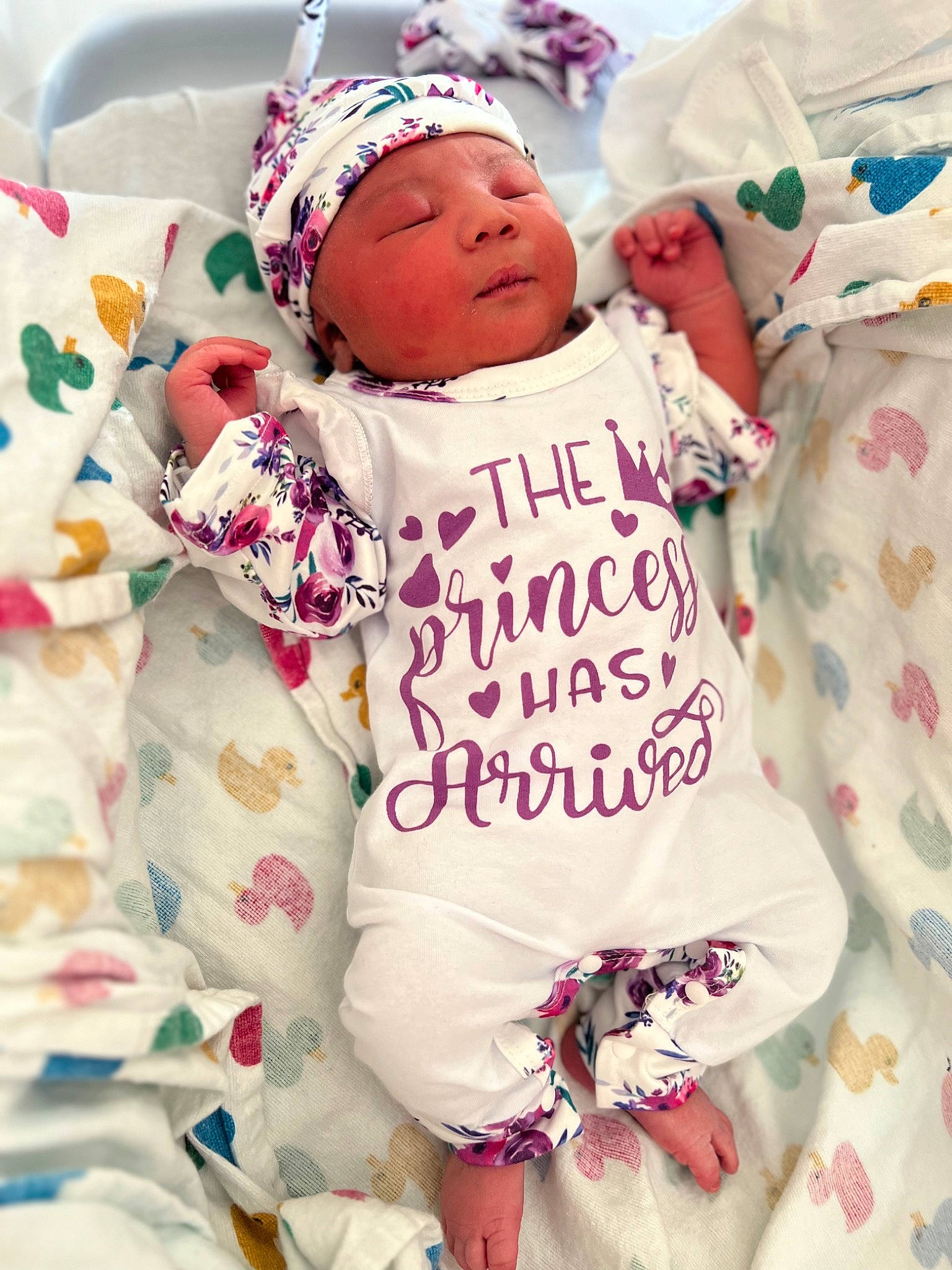 Lailani joined the competition — help win amazing prizes! baby, baby_products, baby_sleeping, baby_toddler_clothing, cap, child, comfort, face, font, happy, hat, headwear, linens, magenta, pattern, person, pink, sleeve, t_shirt, textile