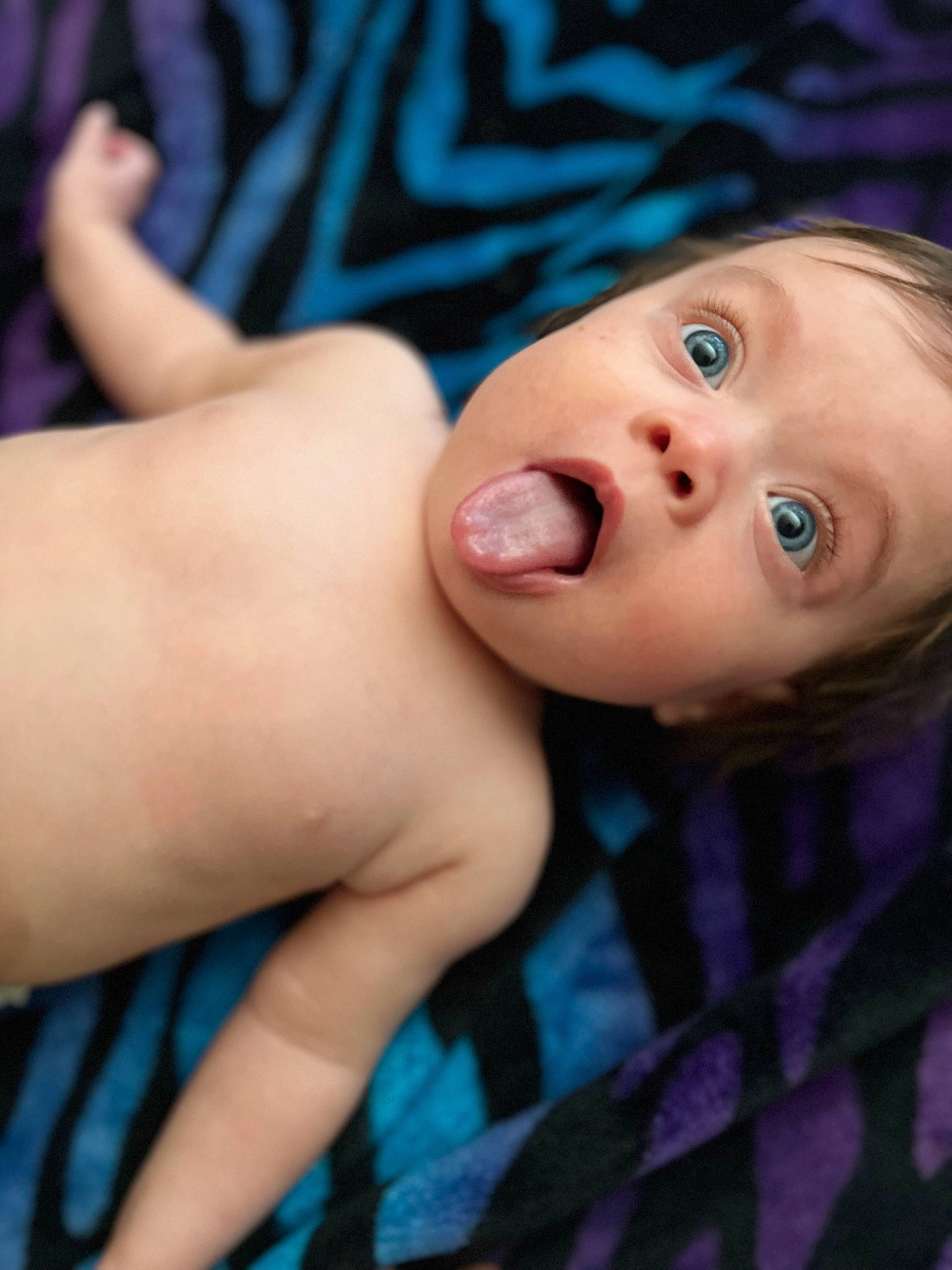 Scarlett is registered to the contest to win money with this photo: baby, blue, cheek, child, elbow, electric_blue, eyebrow, eyelash, finger, flash_photography, gesture, grass, happy, lip, mouth, nail, nose, pattern, person, skin