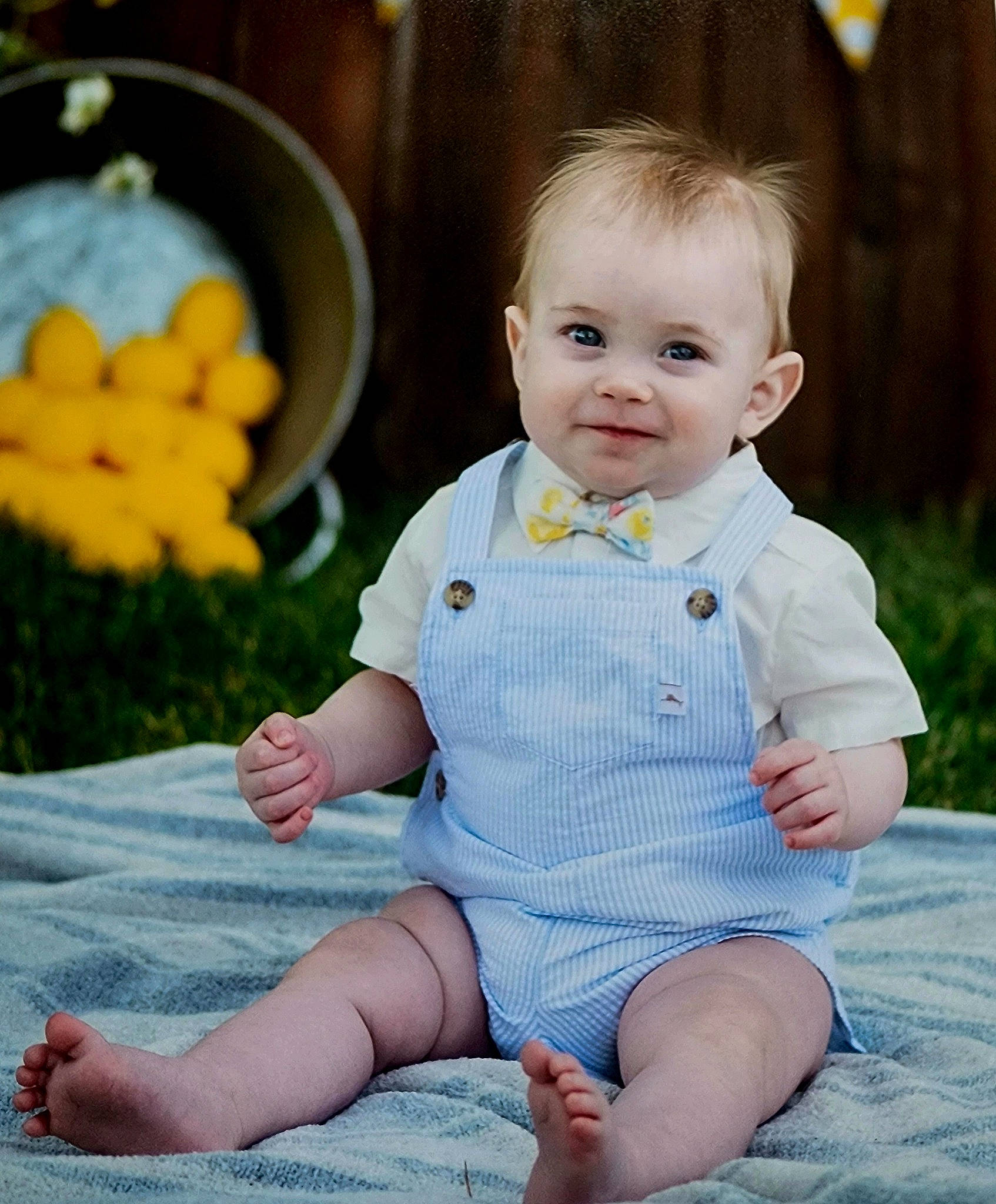 Drayden joined the competition — help win amazing prizes! baby, baby_toddler_clothing, child, dress, eye, face, flash_photography, fun, grass, happy, head, human_leg, iris, joy, pattern, person, plant, sitting, skin, sleeve