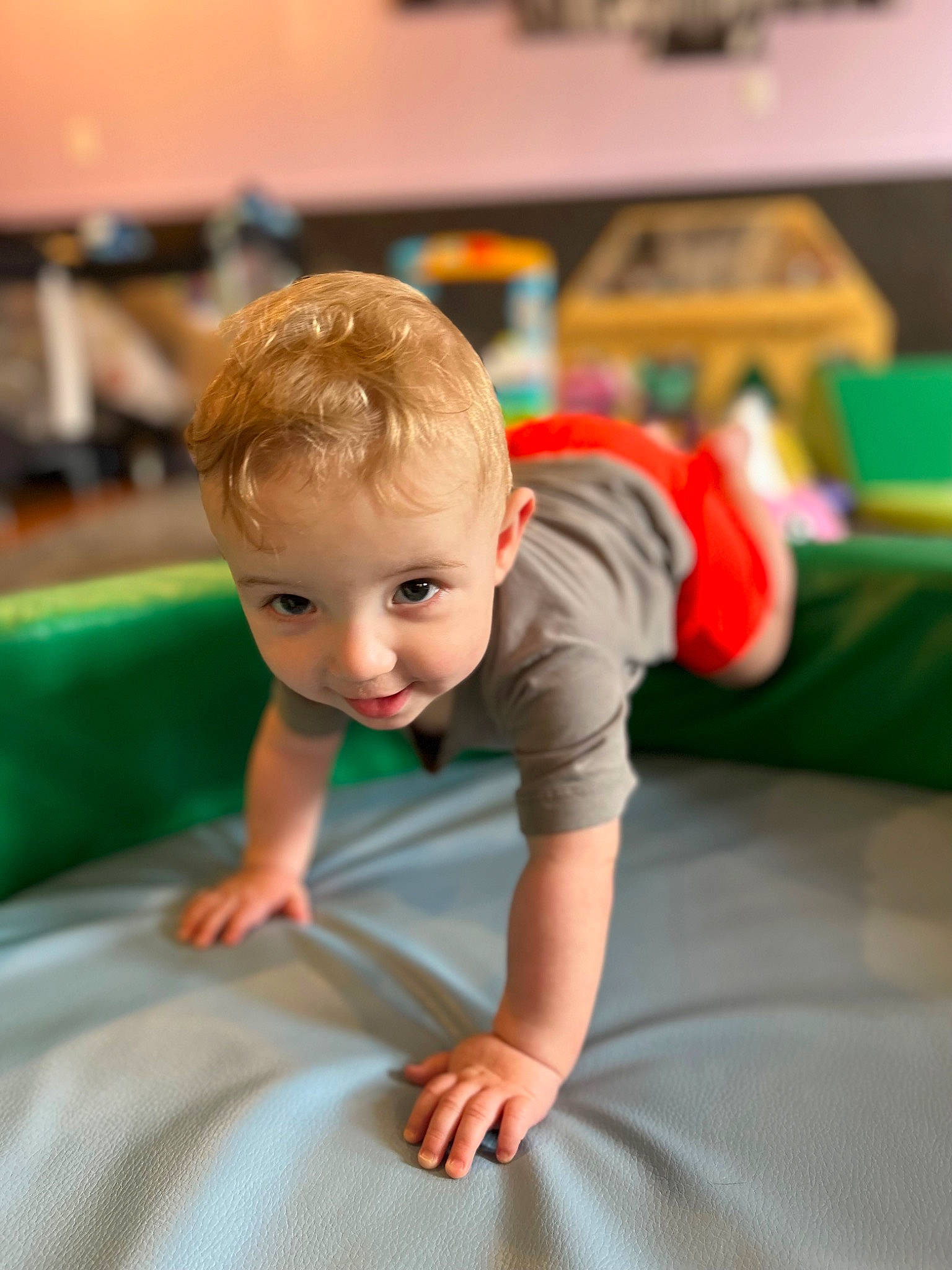 Calvin is registered to the contest to win money with this photo: baby, baby_toddler_clothing, child, comfort, crawling, eye, flooring, fun, happy, hardwood, human_body, knee, leg, leisure, person, play, sitting, sleeve, toddler, toy