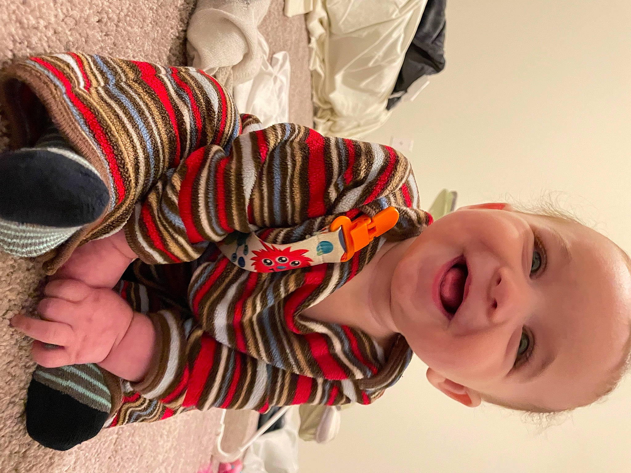 Thor is registered to the contest to win money with this photo: carmine, child, eyewear, fashion_accessory, foot, fun, hairstyle, happy, hat, headgear, mouth, neck, nose, pattern, person, smile, sun_hat, sunglasses, textile, toddler