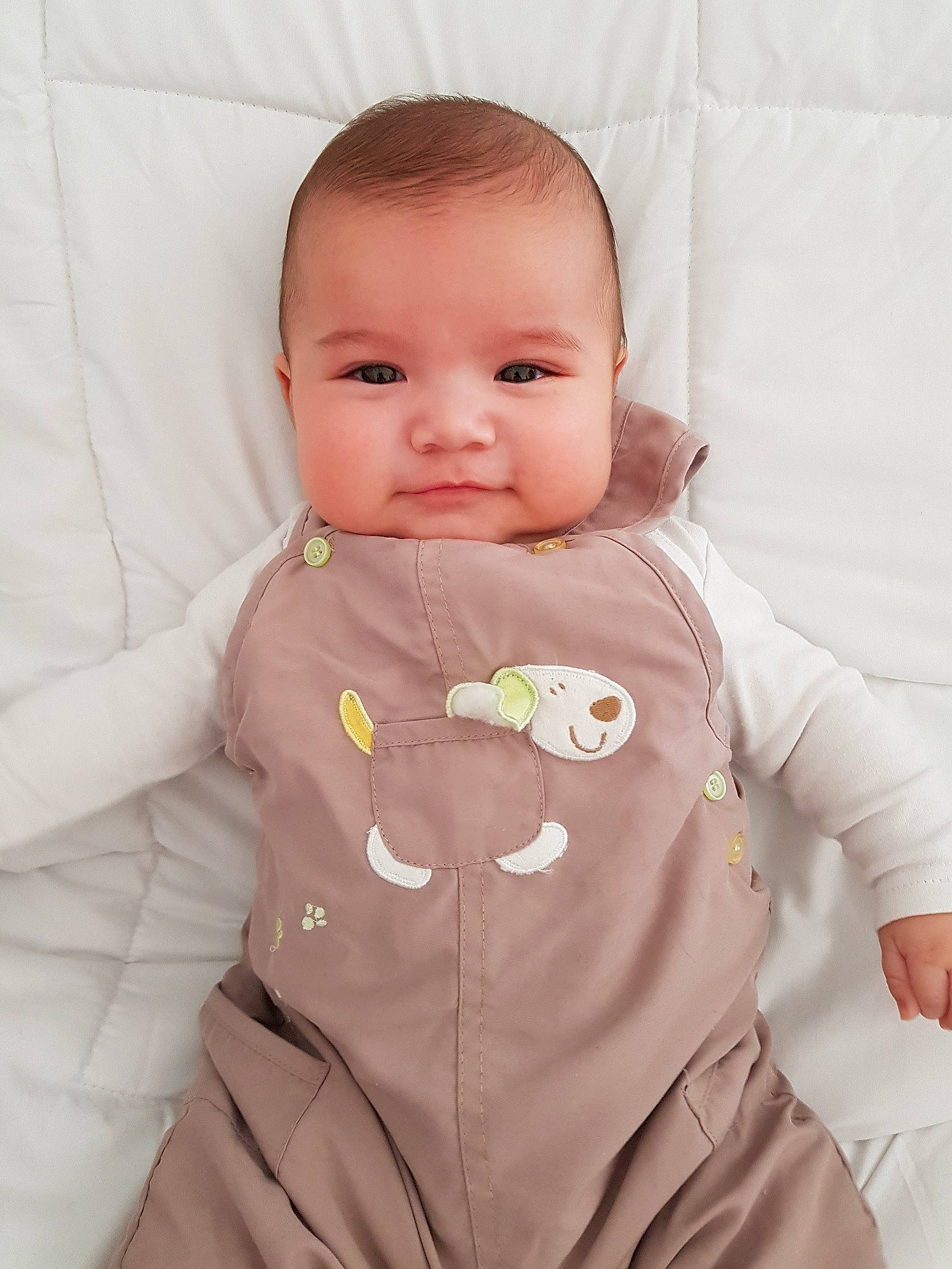 Kael participe au concours pour gagner de l'argent avec cette photo : baby, baby_products, baby_toddler_clothing, cheek, child, face, head, lip, outerwear, person, pink, product, skin, sleeve, toddler