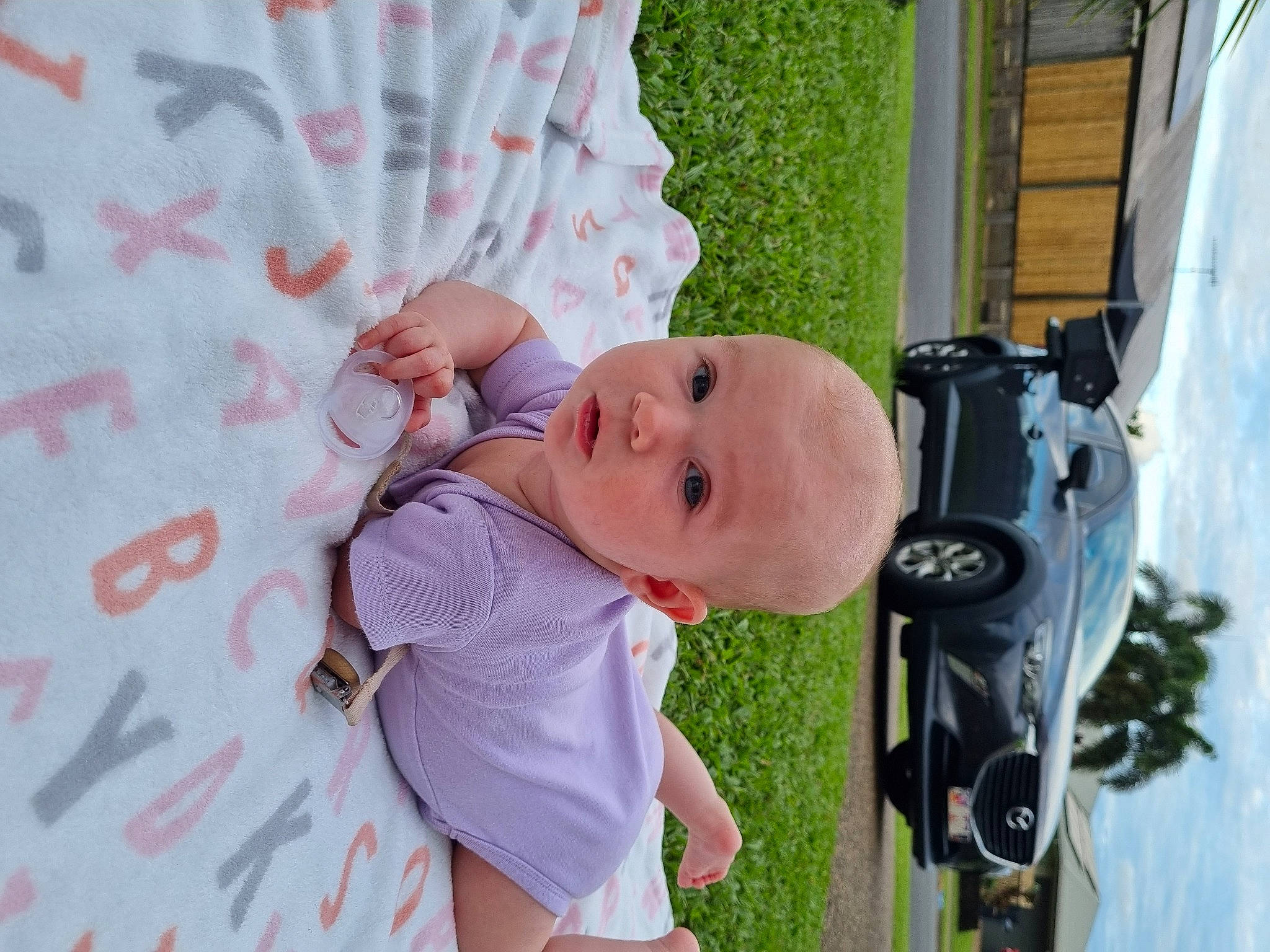 Billie joined the competition — help win amazing prizes! baby, baby_products, baby_toddler_clothing, car, chair, family_car, grass, happy, hat, motor_vehicle, pattern, person, plant, smile, tire, toddler, tree, vehicle, vehicle_door, wheel