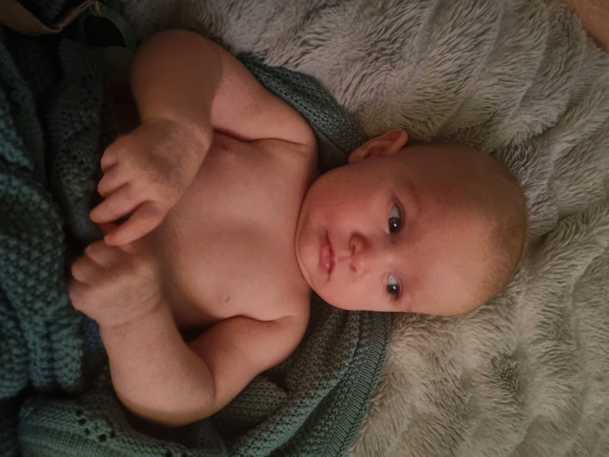 Elyssa is registered to the contest to win money with this photo: abdomen, baby, cheek, chest, chin, comfort, eye, eyebrow, face, gesture, head, human_body, iris, lip, mouth, neck, nose, person, skin, textile