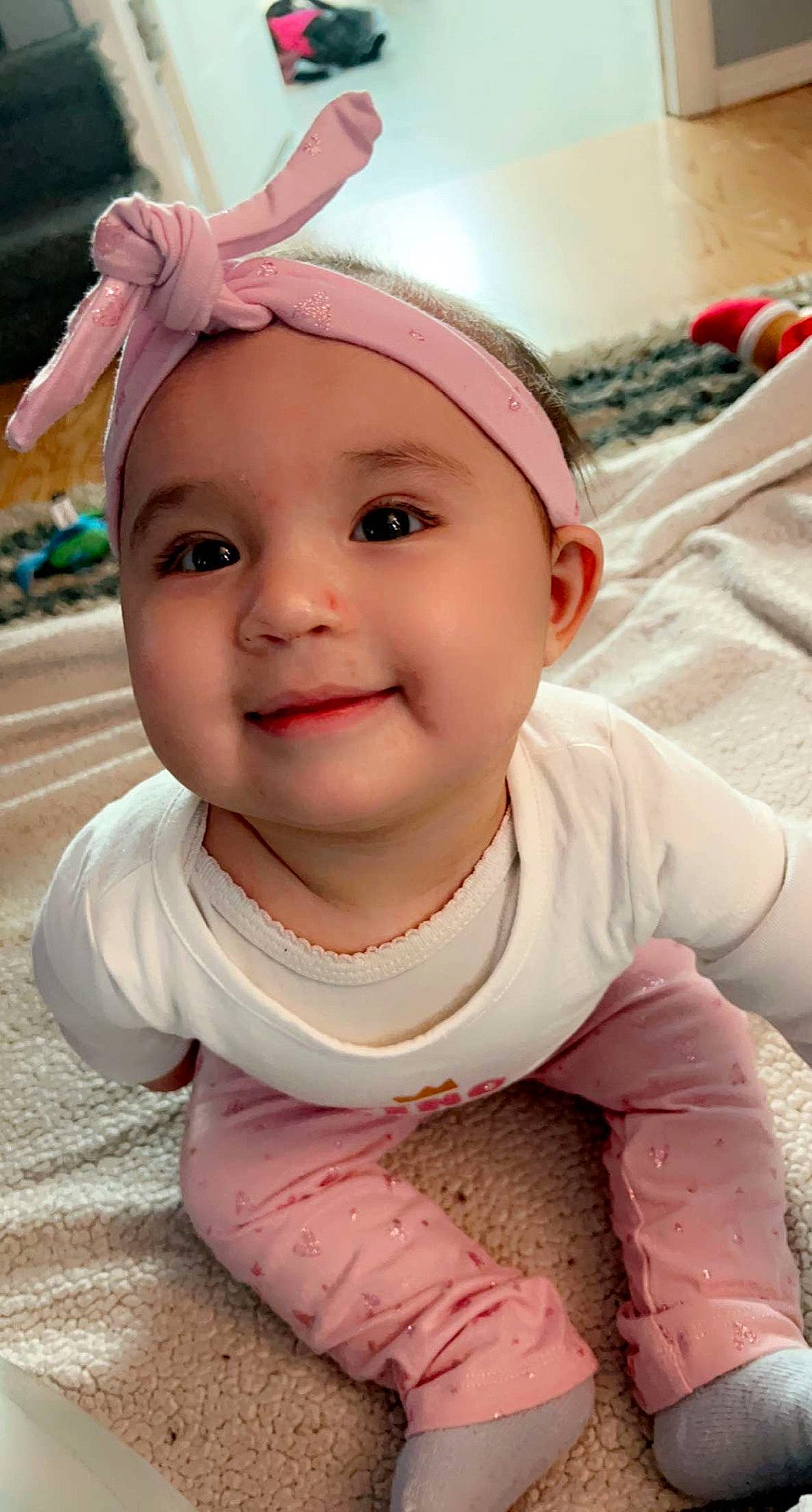Lilianna joined the competition — help win amazing prizes! baby, baby_toddler_clothing, cap, cheek, child, clothing, eyelash, fun, grass, happy, headgear, headwear, iris, joy, lip, mouth, nose, person, pink, skin