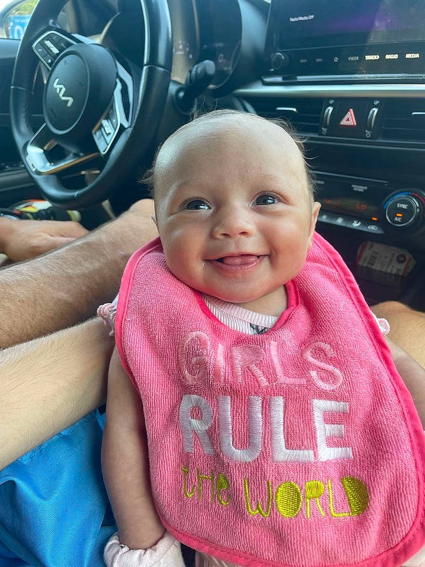 Malani Turley joined the competition — help win amazing prizes! auto_part, automotive_design, automotive_tire, baby, baby_toddler_clothing, car, cool, finger, happy, joy, motor_vehicle, person, personal_luxury_car, product, sleeve, smile, steering_part, steering_wheel, t_shirt, toddler