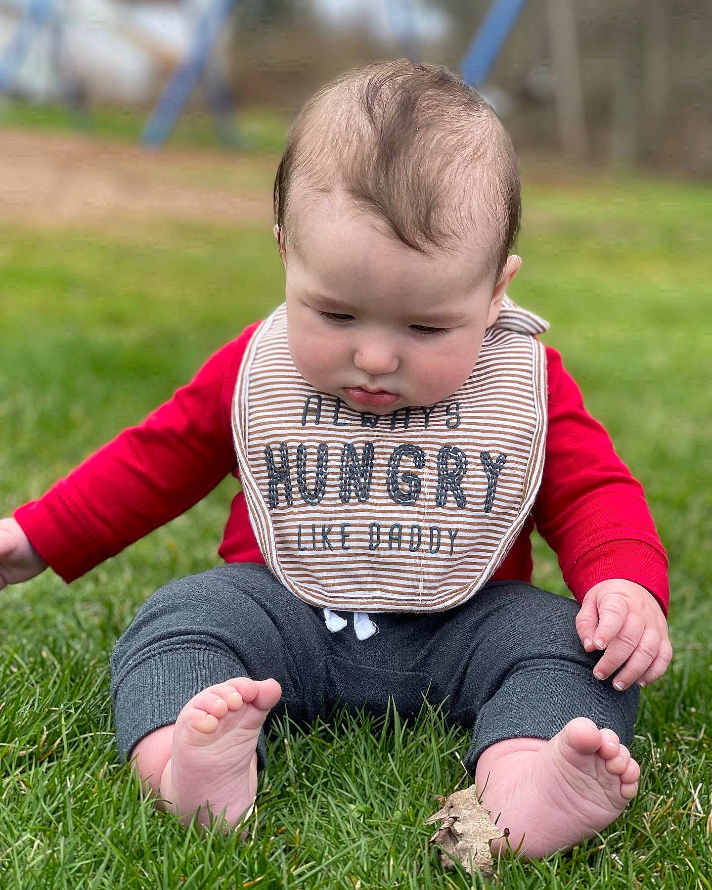 Colton is registered to the contest to win money with this photo: baby, baby_toddler_clothing, child, chin, eye, facial_expression, fun, grass, grass_family, grassland, happy, head, lawn, leaf, people_in_nature, person, plant, skin, sleeve, t_shirt