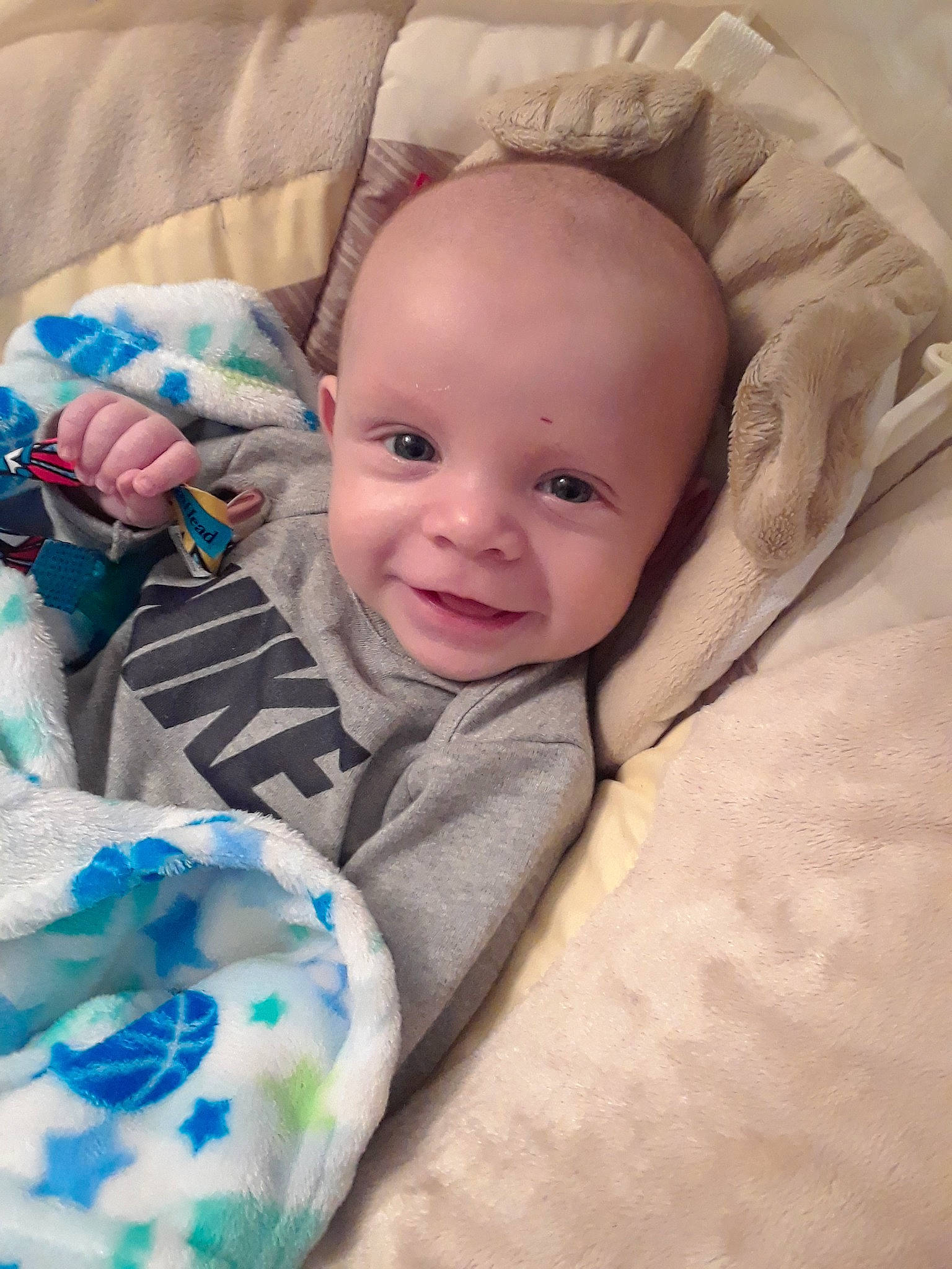 Landon is registered to the contest to win money with this photo: baby_products, bed, bedtime, cheek, child, day, eye, face, head, infant, iris, nose, person, play, product, skin, sleep, smile, textile, toddler
