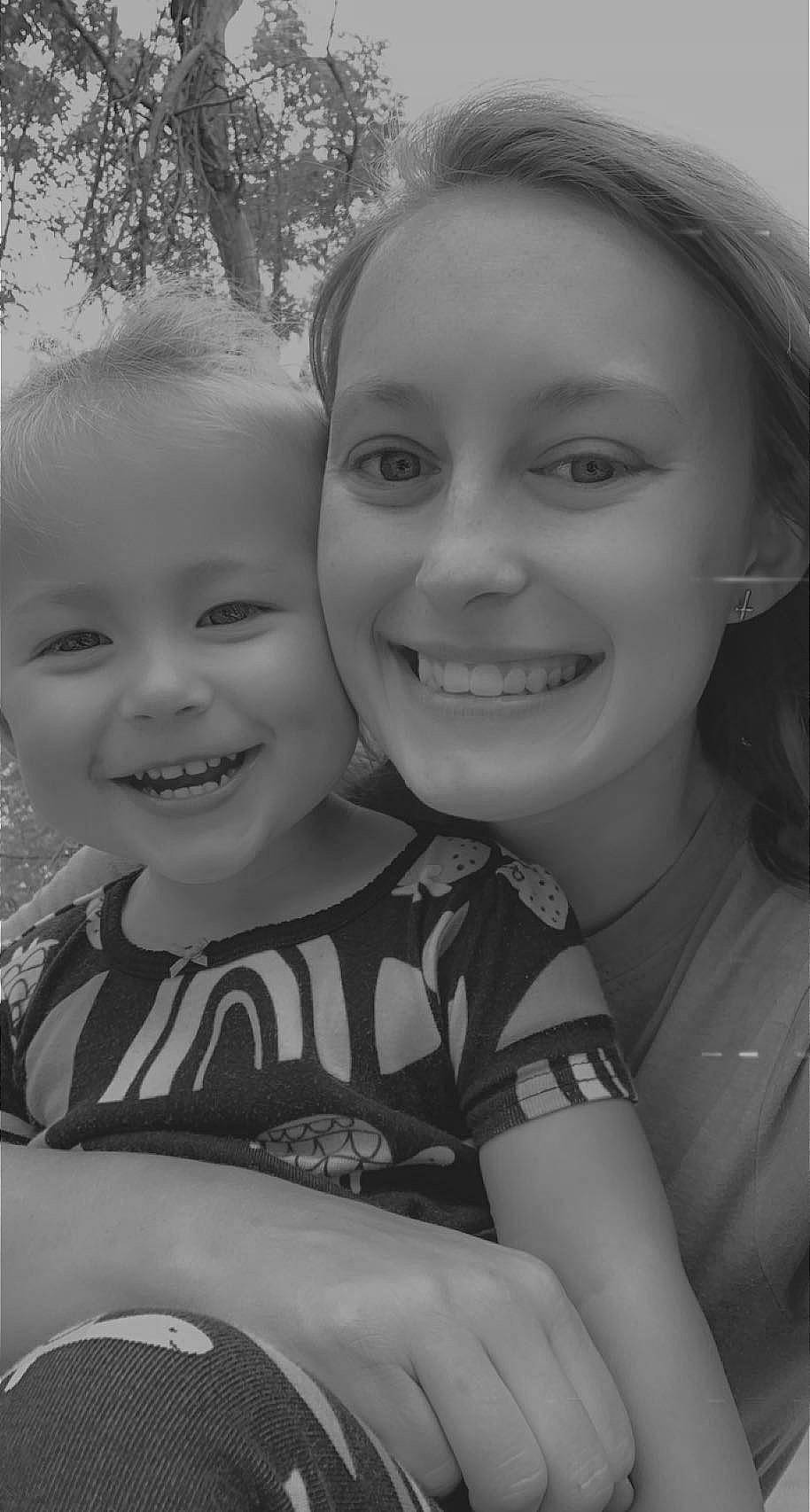 Brooklynn is registered to the contest to win money with this photo: black, black_and_white, chin, eye, eyebrow, face, facial_expression, flash_photography, happy, head, interaction, iris, joy, lip, mouth, nose, people_in_nature, person, skin, smile