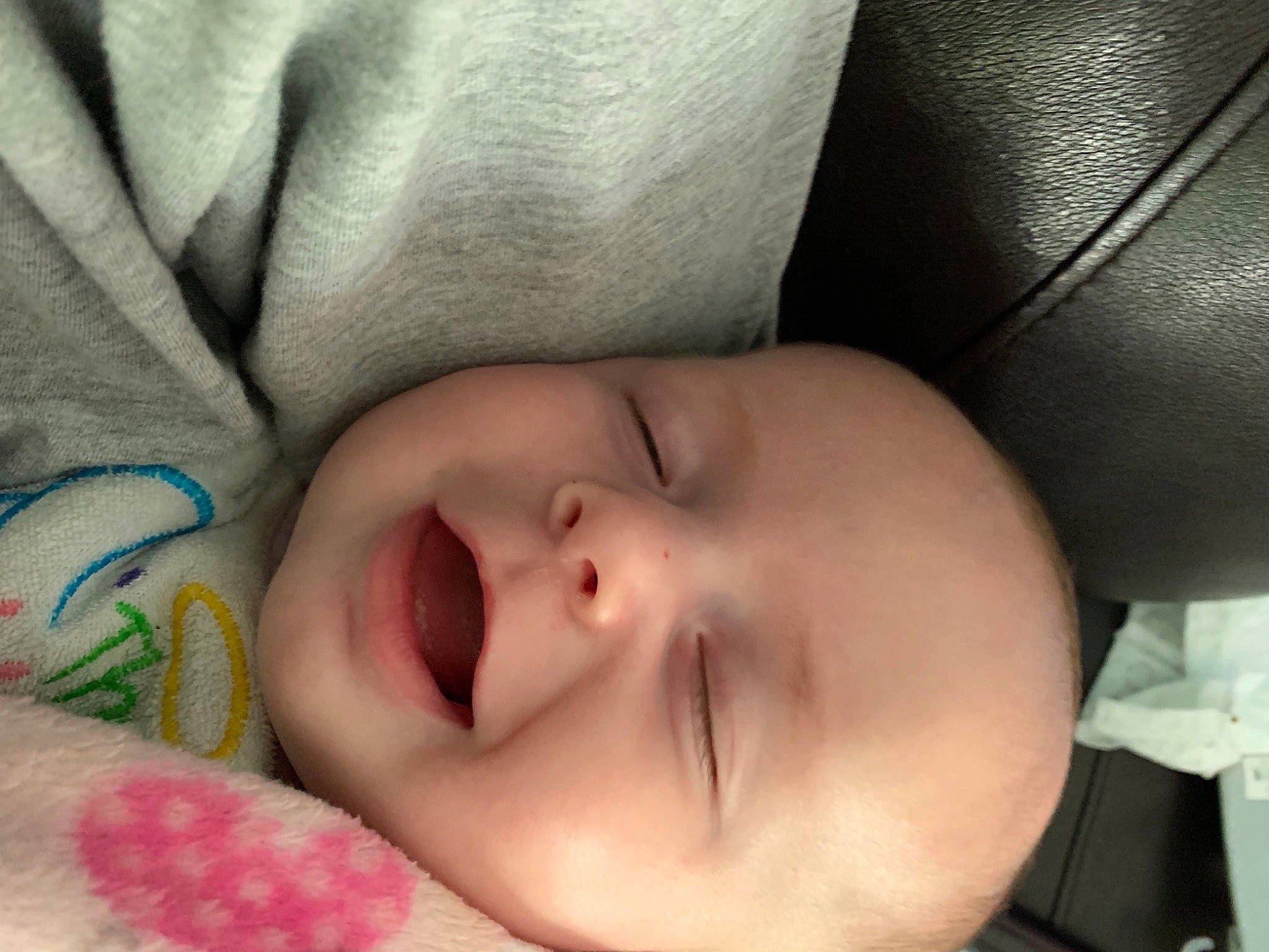 Emmalynn is registered to the contest to win money with this photo: baby, cheek, chin, comfort, eye, eyebrow, eyelash, face, facial_expression, finger, hand, head, headwear, iris, lip, mouth, nose, person, product, skin
