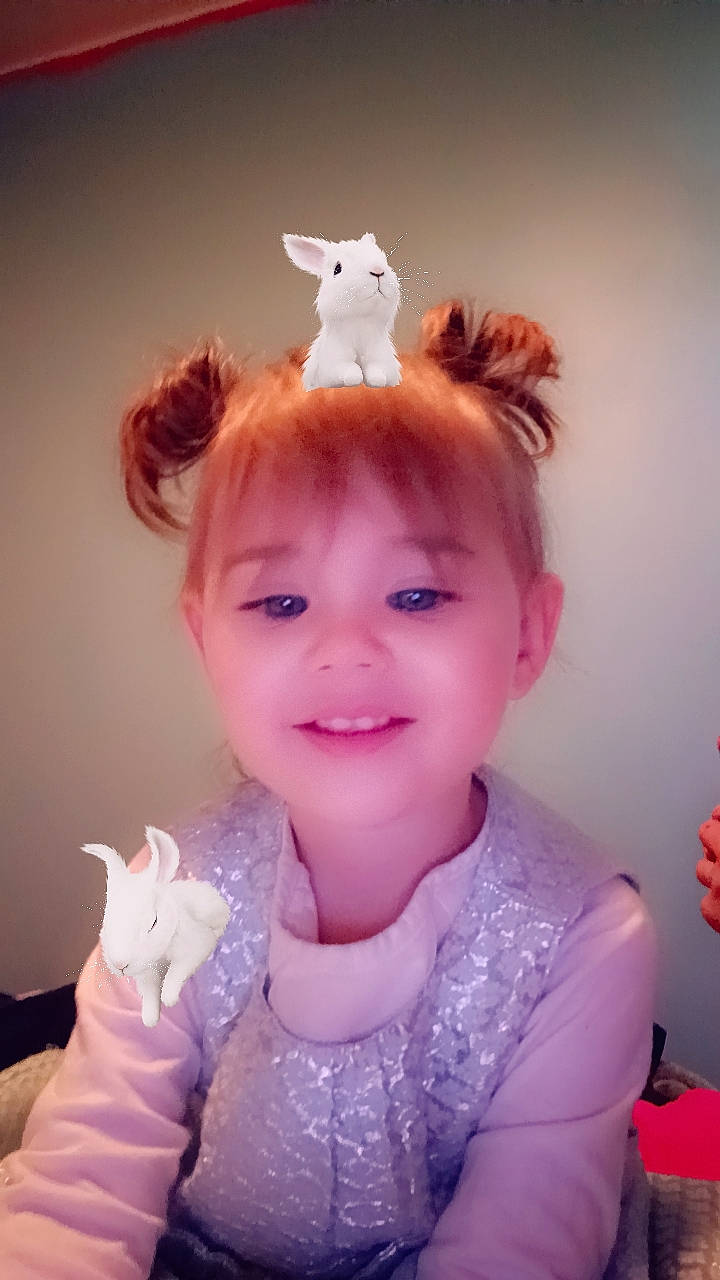 Ameila is registered to the contest to win money with this photo: animal, applique, baby, bodypart, cat, clothing, costume, dress, face, finger, glove, hair, hand, head, pattern, person, pet, photography, portrait, toy