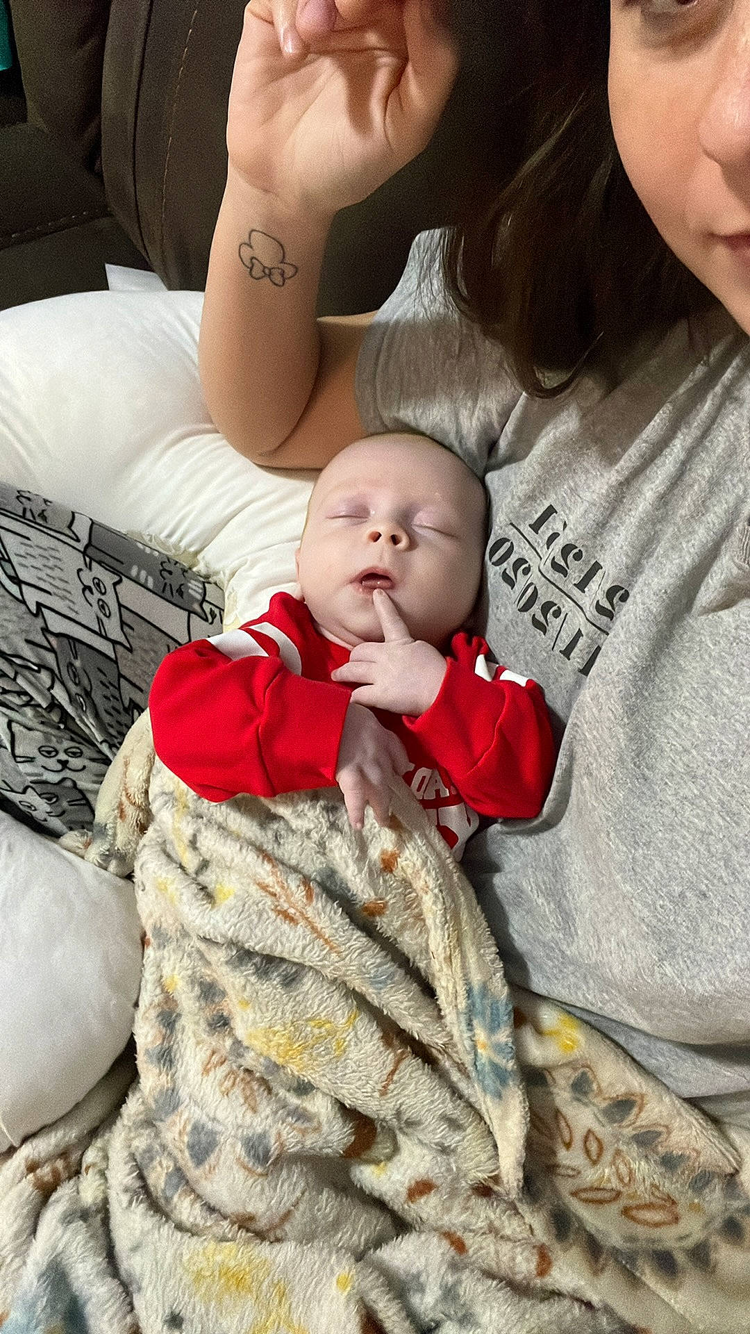 Kyson joined the competition — help win amazing prizes! baby, baby_toddler_clothing, child, comfort, face, facial_expression, finger, fun, gesture, hairstyle, happy, linens, monochrome, mouth, pattern, people, person, sitting, skin, sleeve