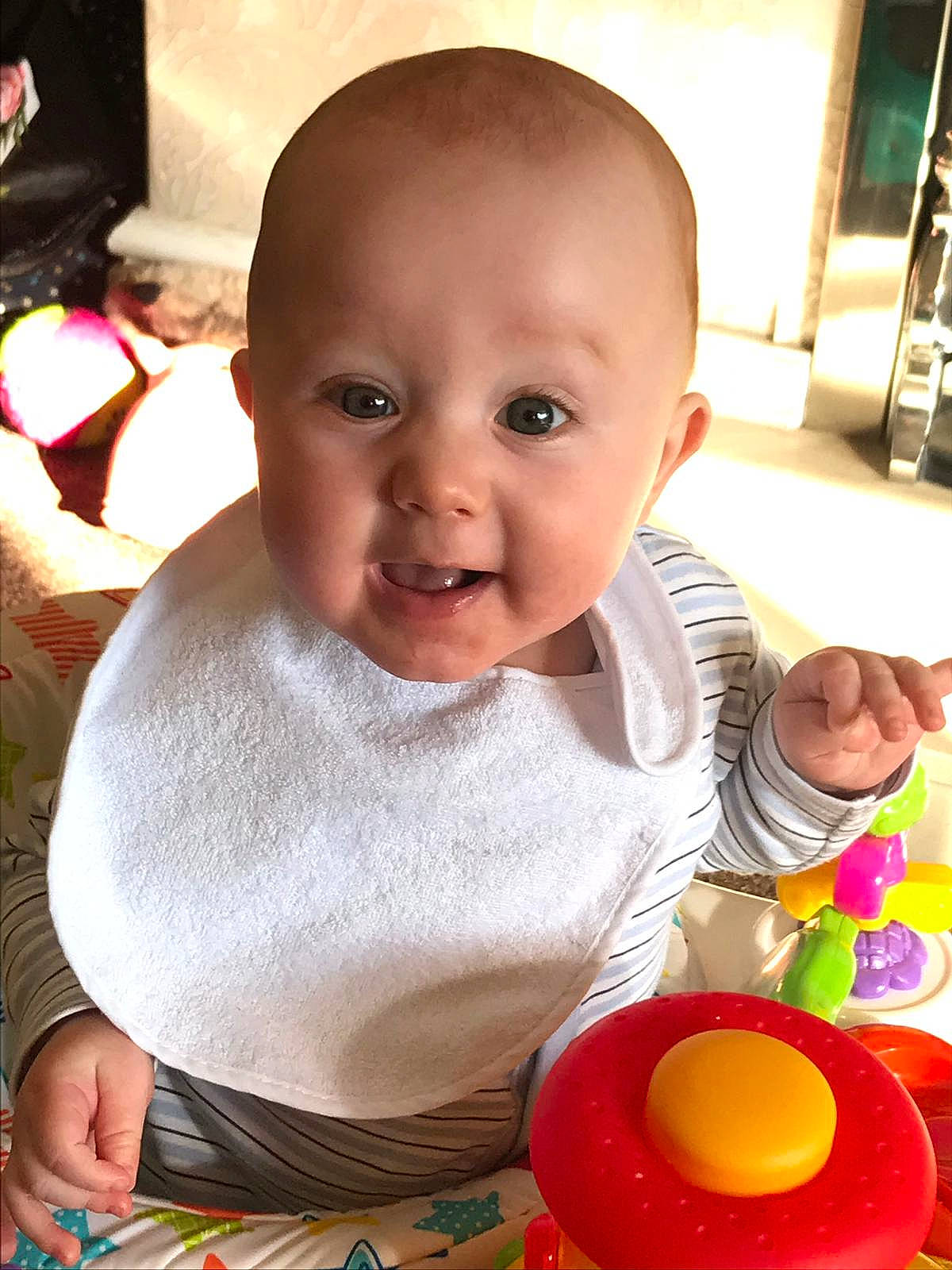 Tommy is registered to the contest to win money with this photo: baby, cheek, child, eating, face, food, fun, head, lip, nose, person, play, sitting, skin, smile, toddler