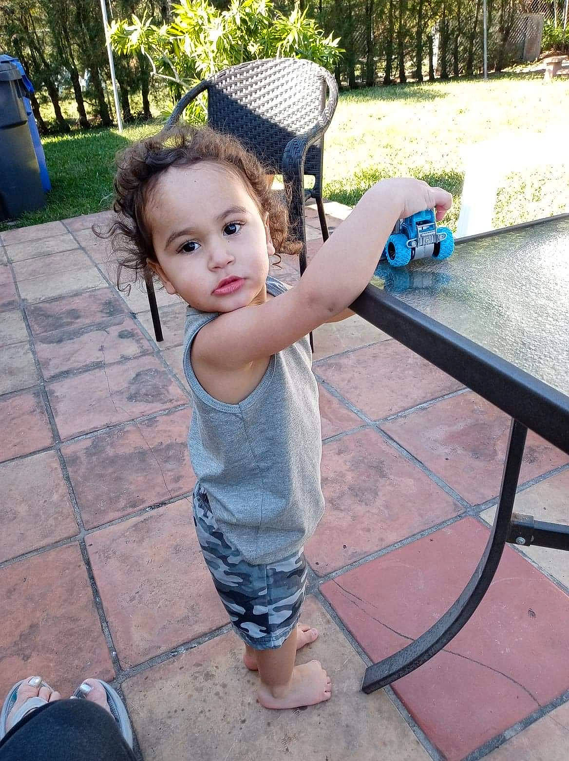 Jay David  is registered to the contest to win money with this photo: baby_toddler_clothing, finger, grass, hairstyle, happy, head, leaf, leg, leisure, morning, organ, outdoor_furniture, person, photograph, plant, shorts, skin, summer, toddler, tree