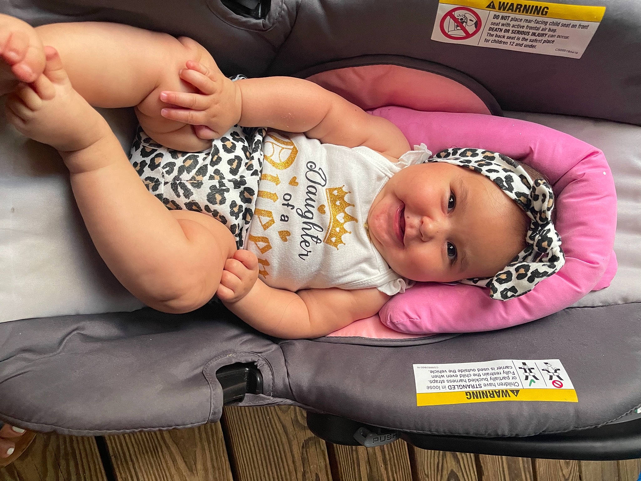 Jaylani joined the competition — help win amazing prizes! abdomen, baby, baby_products, baby_toddler_clothing, barefoot, child, comfort, finger, foot, fun, happy, head, headwear, human_body, human_leg, knee, lap, mouth, person, skin