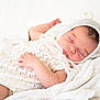 Everlie is registered to the contest to win money with this photo: baby, sleeping, infant, knitwear, white, blanket, soft, cute, bonnet, cozy, peaceful, newborn, child, portrait, rest, tender, closeup, face, hand, cocooned