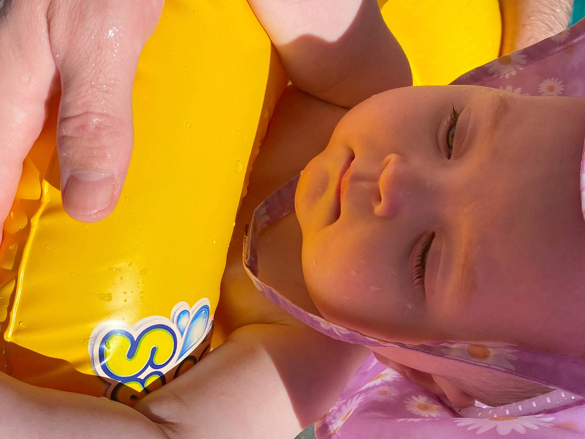 Kayleigh joined the competition — help win amazing prizes! baby, close_up, eyelash, face, facial_expression, finger, fun, gesture, hand, happy, lip, nail, nose, orange, people_in_nature, person, product, skin, thumb, toddler