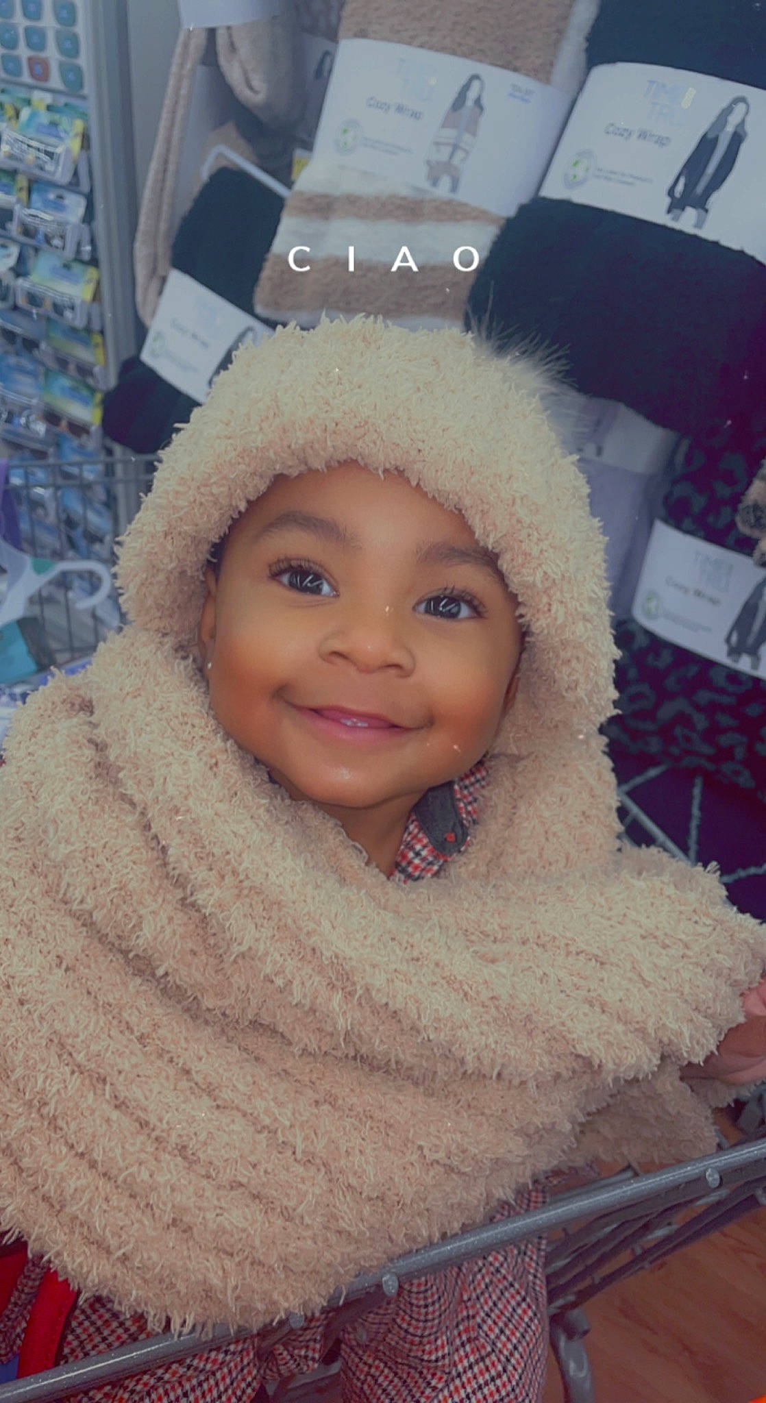 Anaya is registered to the contest to win money with this photo: baby, cap, cheek, child, eye, eyebrow, fashion_accessory, fun, fur, happy, headwear, human_body, iris, joy, knit_cap, lip, nose, person, skin, smile