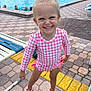 Paige joined the competition — help win amazing prizes! child, girl, smiling, swimsuit, pool, outdoor, pavement, crocs, water, playful, summer, people, recreation, fun, happy, standing, swimming_pool, casual, daylight, vacation
