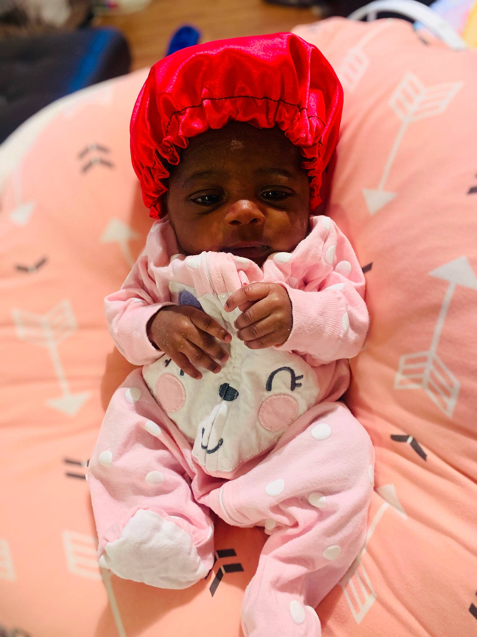 Kennedi is registered to the contest to win money with this photo: baby, baby_sleeping, baby_toddler_clothing, cheek, child, comfort, event, fun, happy, jacket, linens, magenta, peach, person, pink, red, sitting, skin, sleeve, textile