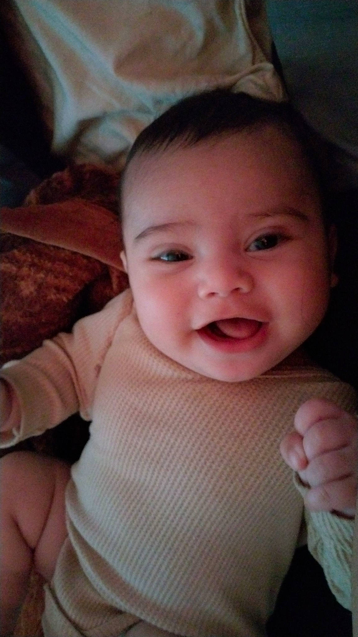 Armando is registered to the contest to win money with this photo: baby, baby_toddler_clothing, cheek, chin, eye, eyebrow, eyelash, finger, forehead, gesture, happy, iris, lip, mouth, neck, nose, person, pink, skin, sleeve