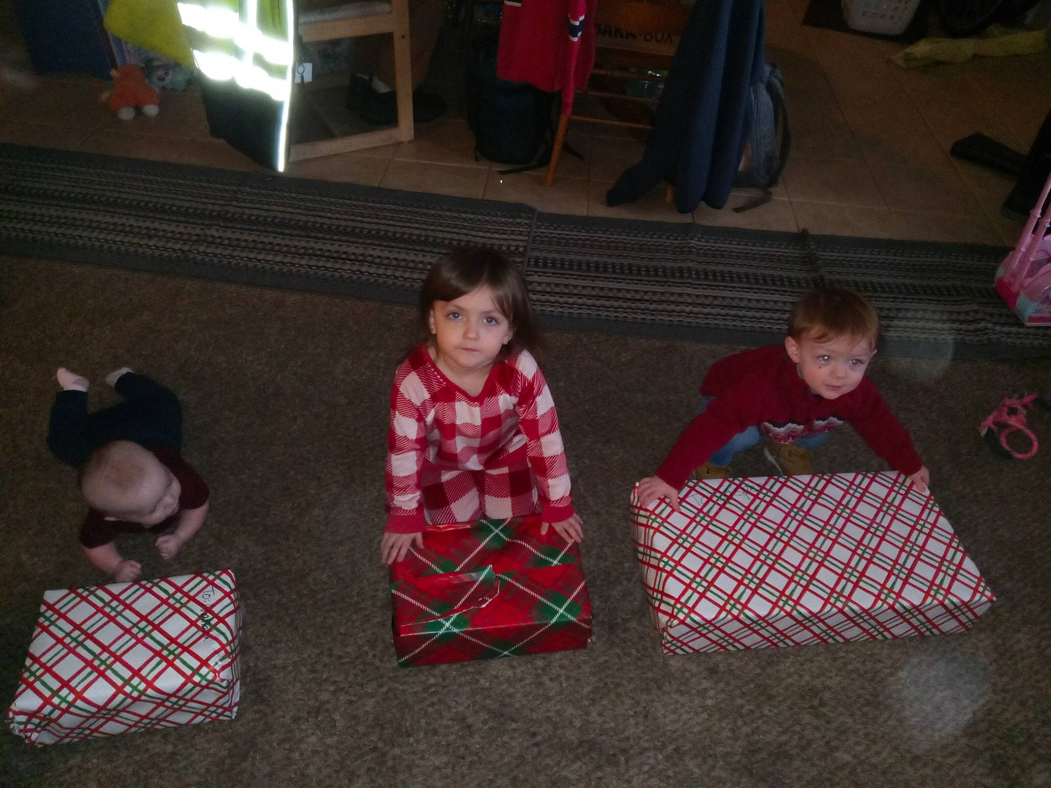 Makinzly joined the competition — help win amazing prizes! child, christmas, comfort, design, event, flooring, fun, holiday, lap, pattern, people, person, plaid, red, room, sharing, sitting, tartan, textile, toddler