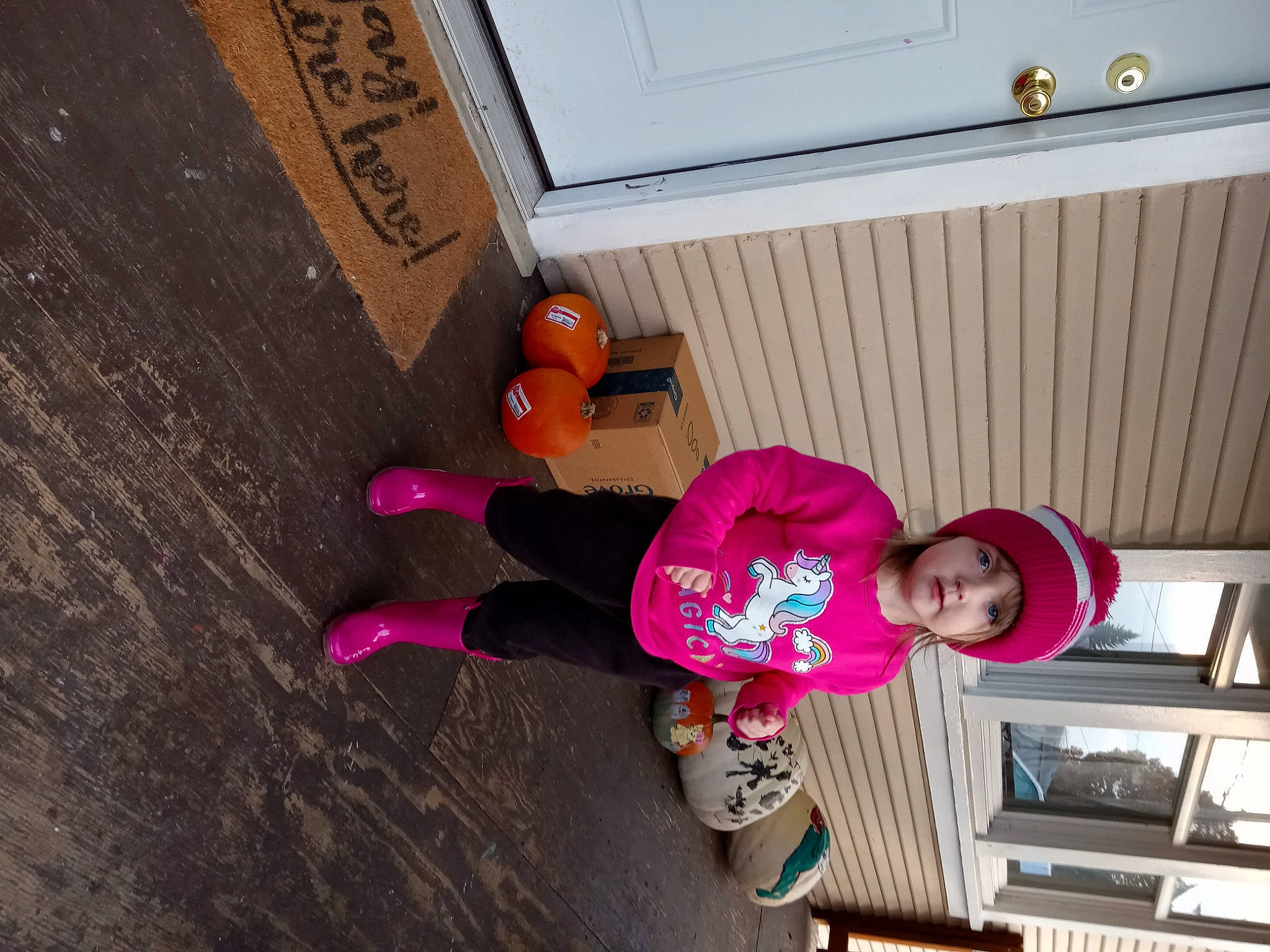 Makinzly joined the competition — help win amazing prizes! boot, child, floor, flooring, fun, hardwood, hat, headwear, house, magenta, material_property, person, pink, plant, purple, room, sneakers, toddler, tree, wall