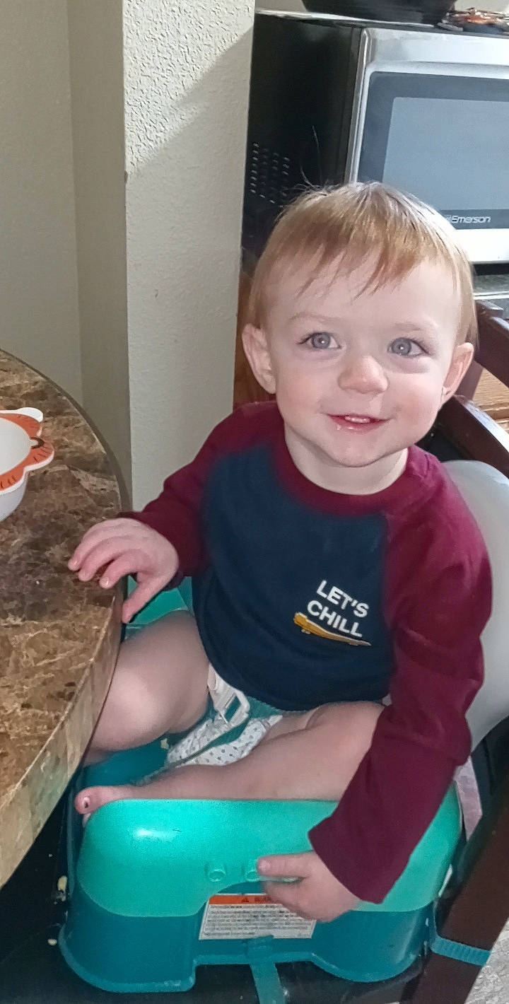 Jasper joined the competition — help win amazing prizes! baby, chair, child, christmas, fun, happy, holiday, joy, lap, leisure, person, sitting, skin, smile, t_shirt, television, thigh, toddler, vacation