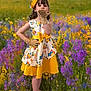 child, colorful, cute, floral_pattern, flower_field, girl, gloves, grass, headband, nature, outdoor, playful, portrait, smiling, spring, standing, white_shoes, wildflowers, yellow_dress, young_child