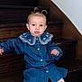 child, toddler, denim_dress, pigtails, stairs, wood, white_tights, sitting, indoor, cute, portrait, young_child, fashion, collar, buttoned_dress, expression, person, face, hair_style, casual