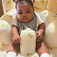Journee joined the competition — help win amazing prizes! adorable, baby, baby_girl, child, chubby_cheeks, clothing, container, cute, hair_buns, hair_clips, indoor, infant, inflatable_chair, person, plush, seat, smiling, teddy_bear, toddler, white_socks