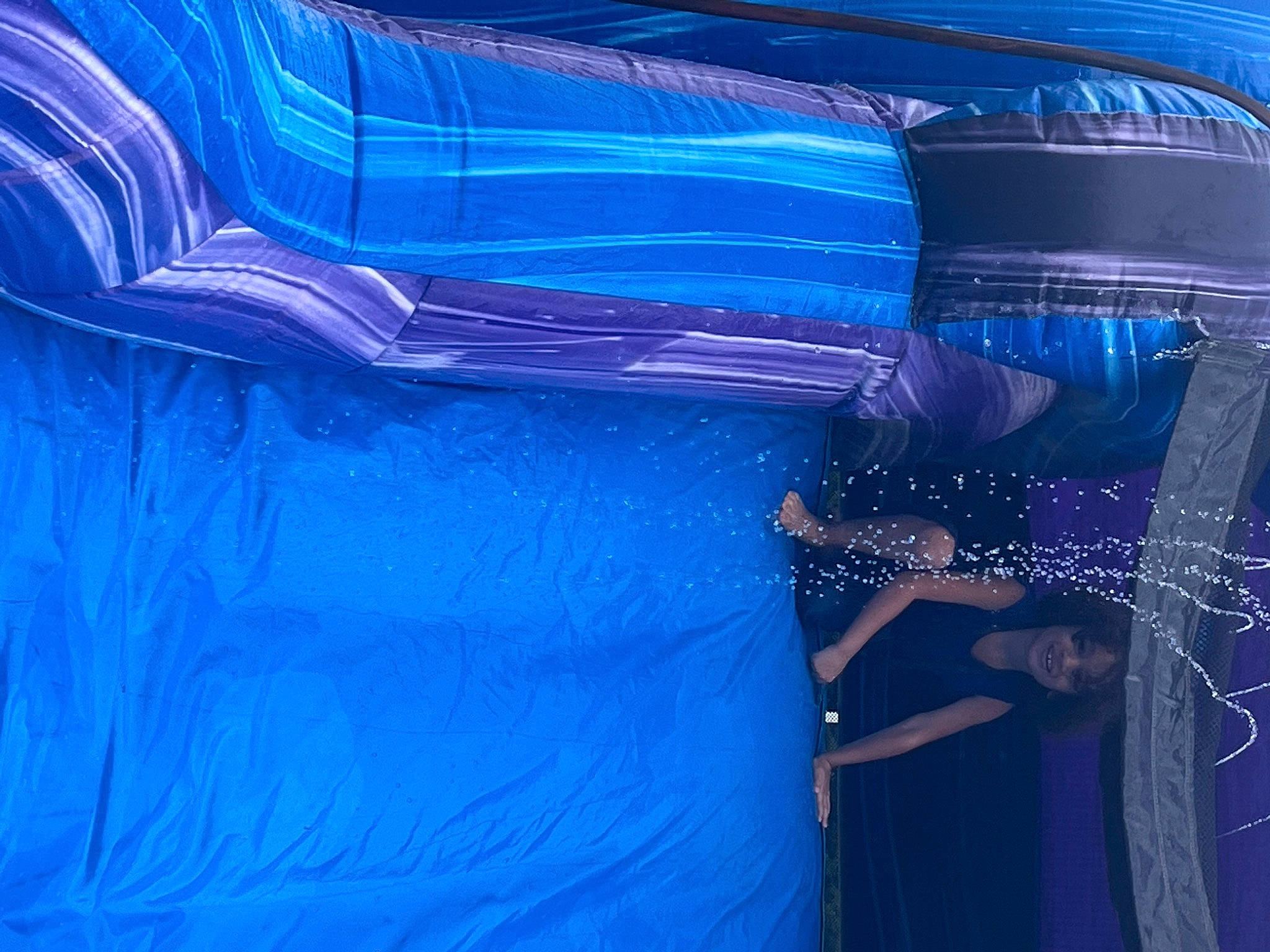 Israel is registered to the contest to win money with this photo: aqua, art, automotive_lighting, azure, blue, denim, electric_blue, hood, joy, magenta, paint, pattern, person, plastic, purple, recreation, sleeve, tarpaulin, textile, tints_and_shades