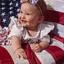 americanflag, baby, babylaughing, clothing, face, flag, happy, head, person, photography, portrait, sailorsuit, sitting, sleeve, smile