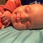 Kinsley is registered to the contest to win money with this photo: baby, blanket, bodypart, face, finger, hand, head, newborn, person, photography, portrait, sleeping