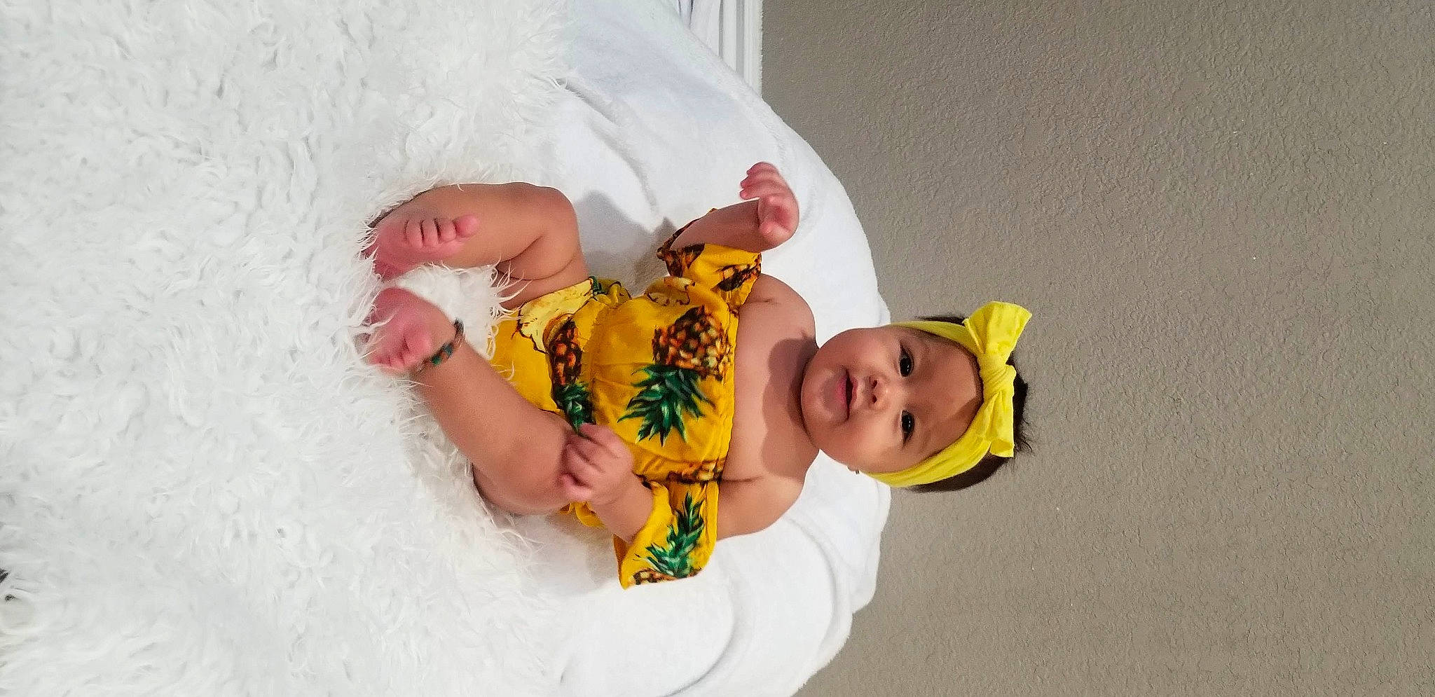 Izabel is registered to the contest to win money with this photo: abdomen, baby, baby_products, baby_toddler_clothing, child, ear, elbow, hair_accessory, headband, headwear, person, stomach, toddler, yellow