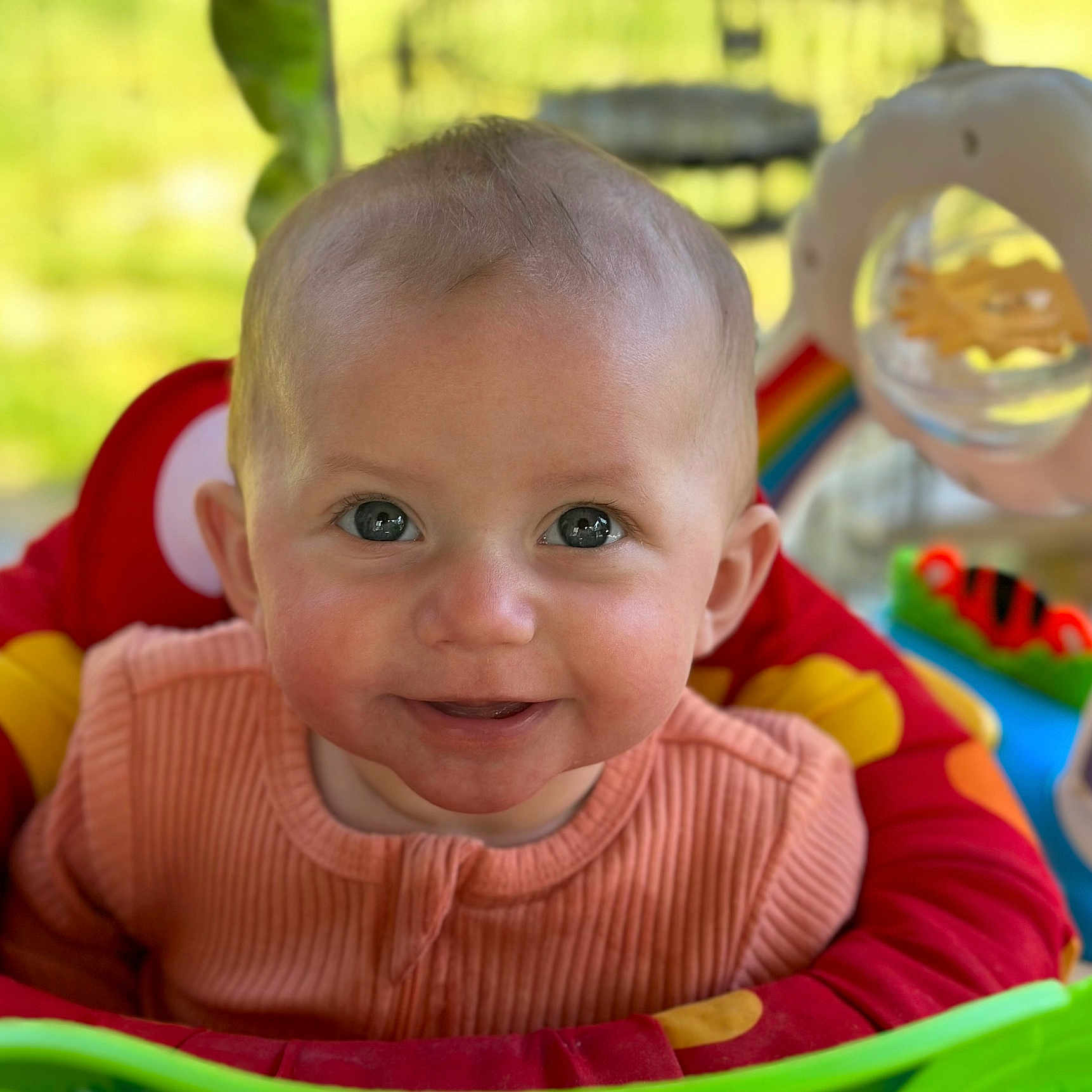 Octavia joined the competition — help win amazing prizes! baby, babylaughing, clothing, coat, face, happy, head, indoors, jacket, knitwear, laughing, outdoorplayarea, outdoors, person, photography, playarea, portrait, smile, sweater, toy