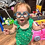 accessories, baby, bag, bodypart, clothing, dress, face, footwear, furniture, glasses, goggles, handbag, head, indoors, person, photography, portrait, shoe, sunglasses, toy