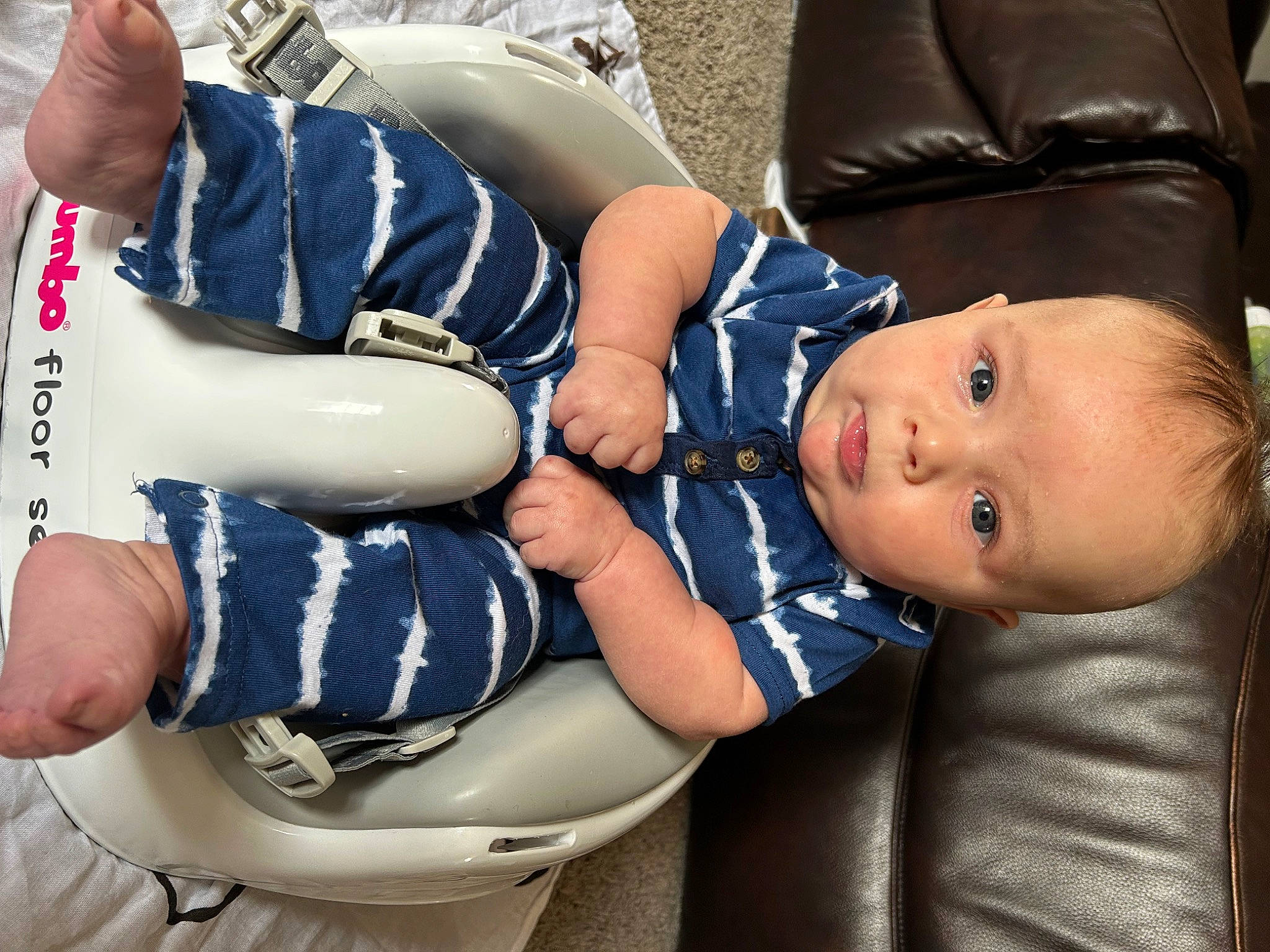 Colter joined the competition — help win amazing prizes! baby, baby_toddler_clothing, bracelet, child, comfort, elbow, electric_blue, fashion_accessory, gesture, human_leg, knee, pattern, person, sitting, sleeve, thigh, toddler, uniform, vertebrate, wrist