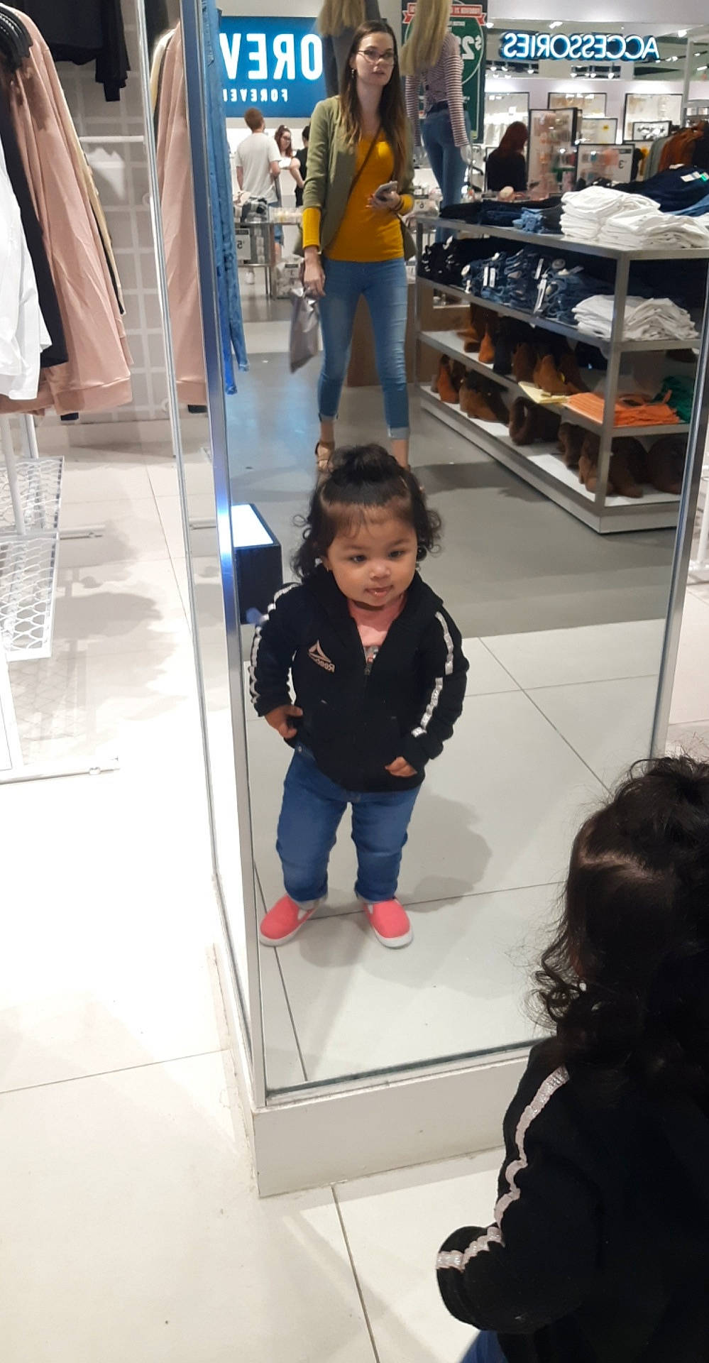Kataleya is registered to the contest to win money with this photo: architecture, child, floor, fun, person, reflection, shoe, shopping, shopping_mall, snapshot, standing, toddler, tourist_attraction, vacation