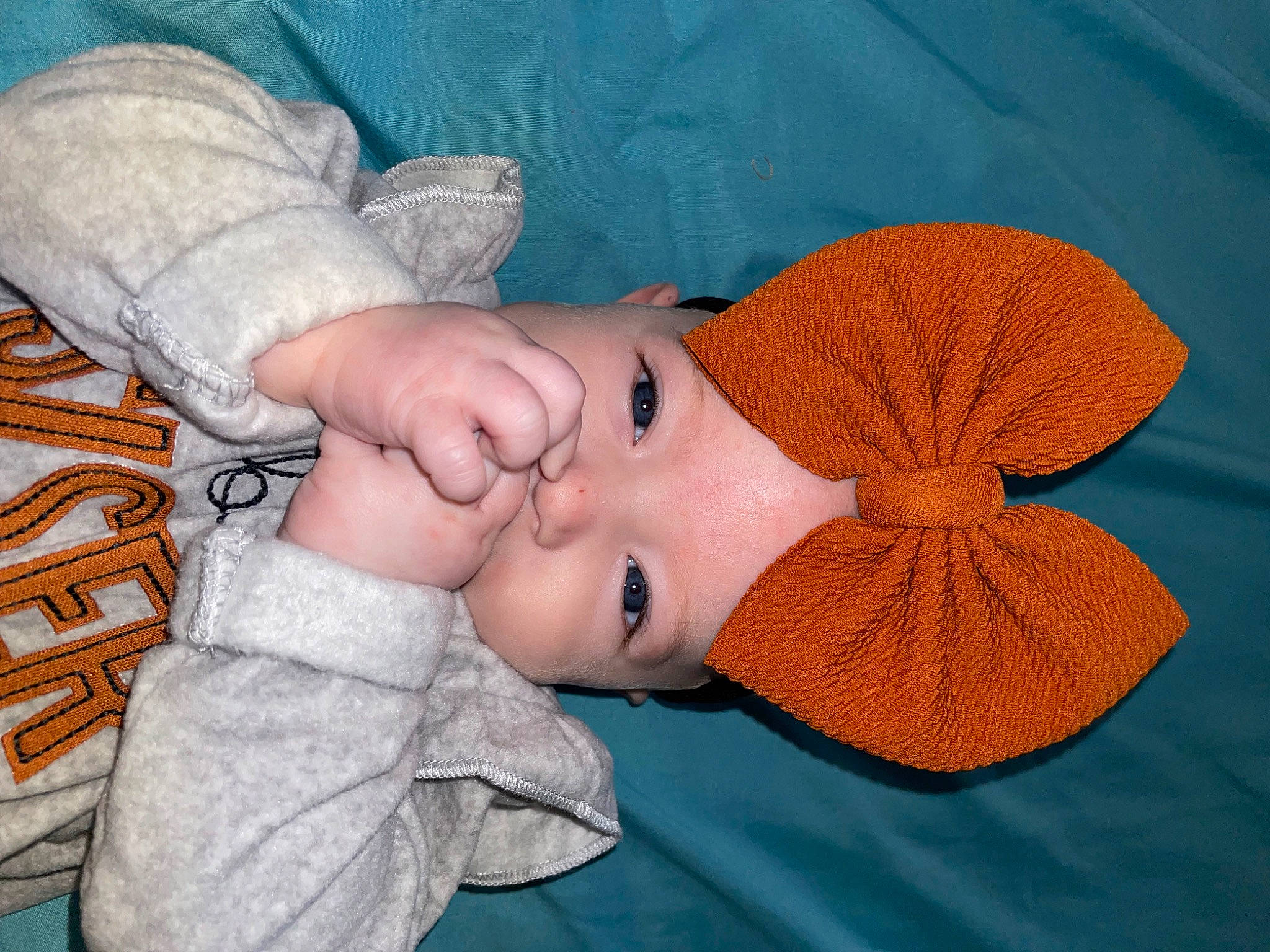 Mariana is registered to the contest to win money with this photo: baby, baby_products, baby_toddler_clothing, child, comfort, craft, eyelash, fashion_accessory, hair_accessory, headgear, headwear, knit_cap, linens, pattern, peach, person, thread, toddler, wood, wool