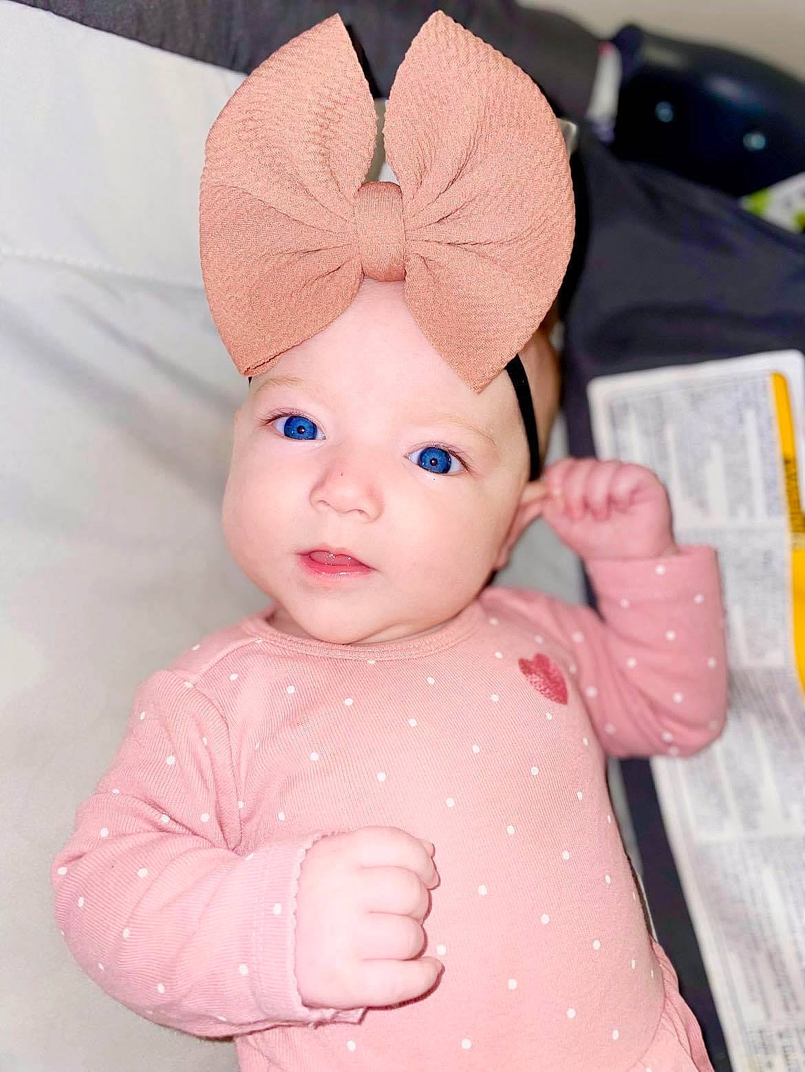 Mariana joined the competition — help win amazing prizes! baby, baby_toddler_clothing, cap, cheek, costume_hat, ear, fashion_accessory, happy, head, headband, headgear, headpiece, headwear, knit_cap, magenta, pattern, peach, person, pink, sleeve