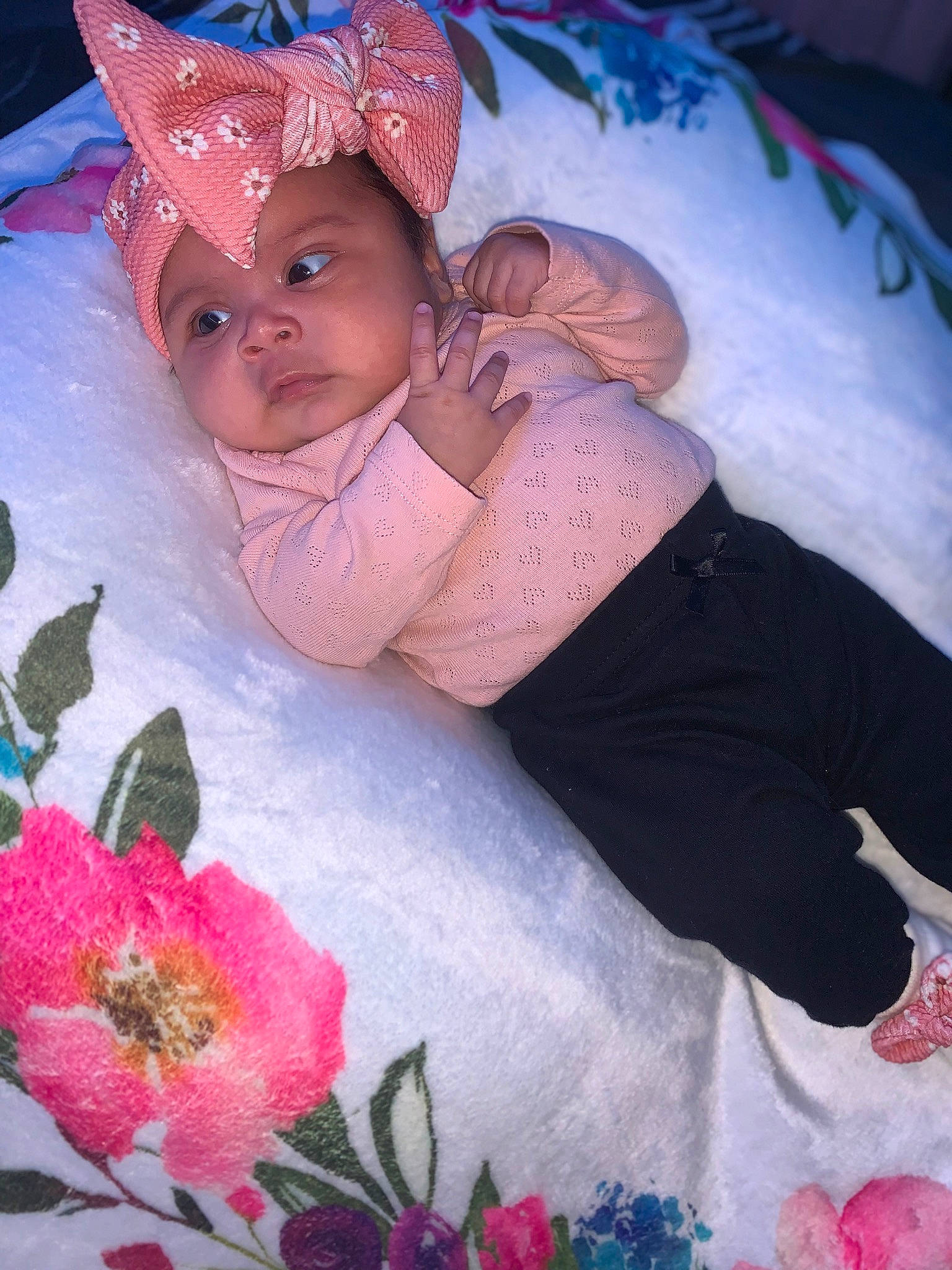 Jaylanie is registered to the contest to win money with this photo: baby, baby_products, blue, cap, child, face, flower, happy, headwear, leisure, linens, magenta, mouth, pattern, person, petal, pink, red, smile, textile